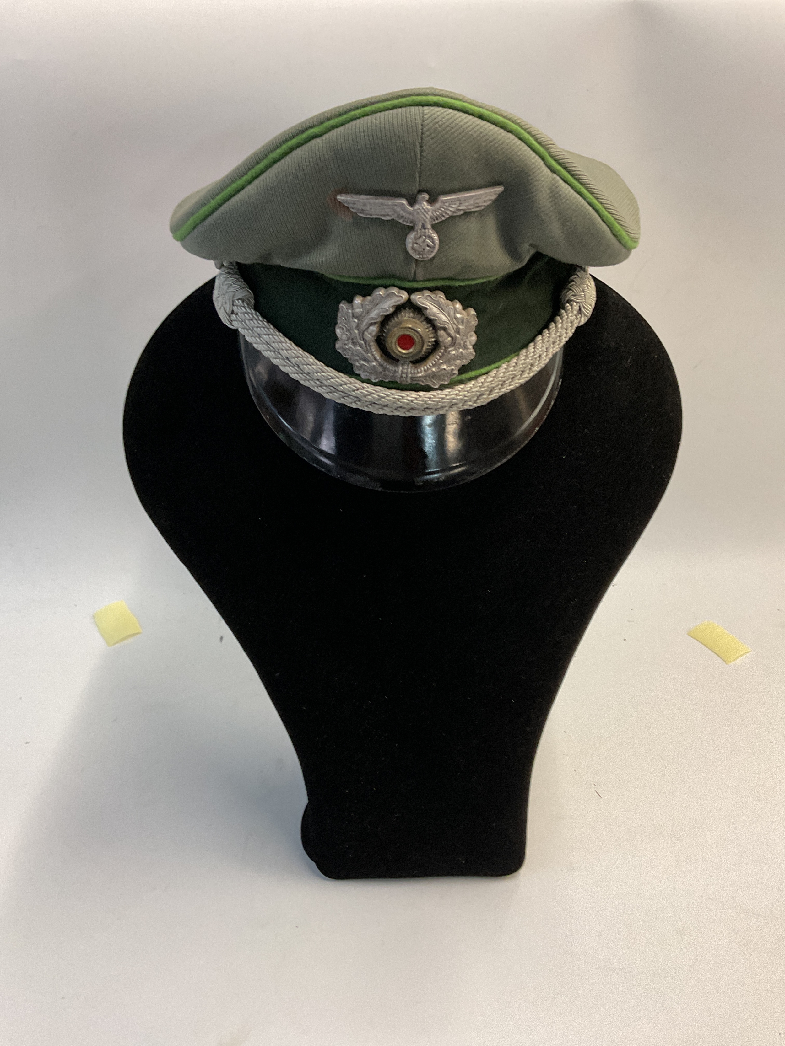 WWII German Army Officers peaked cap with green piping.