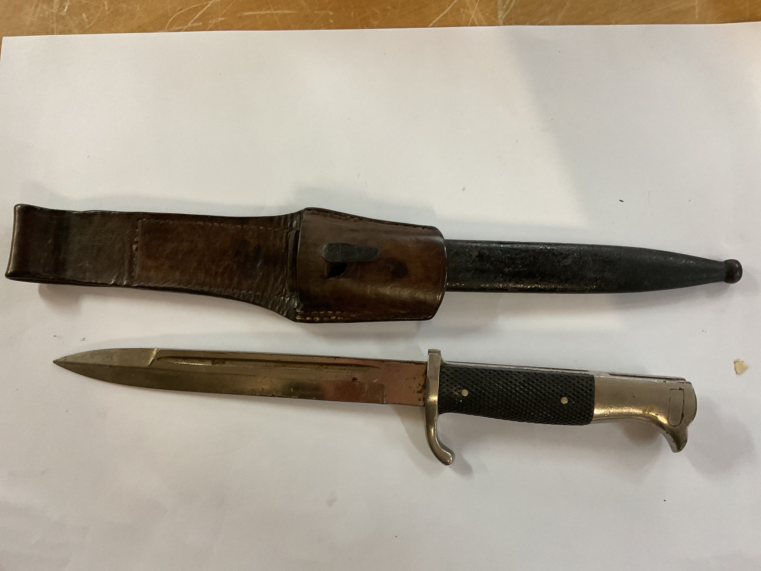 WWII W.K.C.bladed German dress bayonet in sheath and frog.
