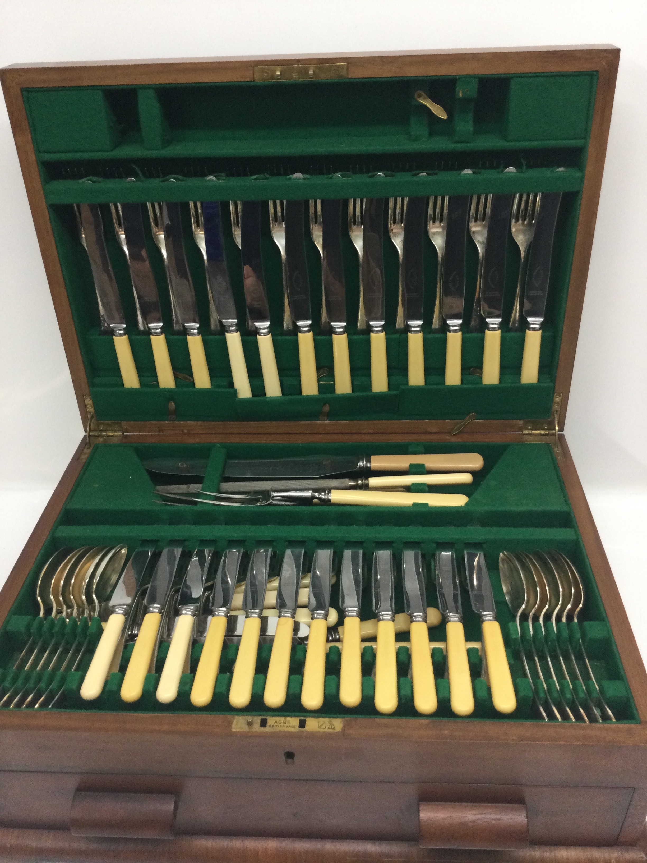 A vintage canteen of cutlery in a mahogany case
