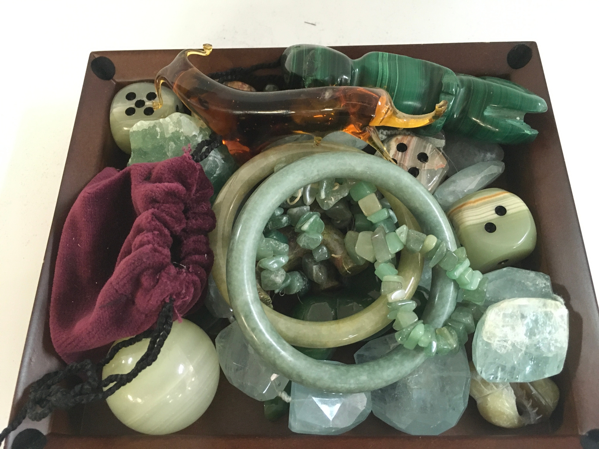 A collection of green stone jewellery and ornaments etc. no reserve
