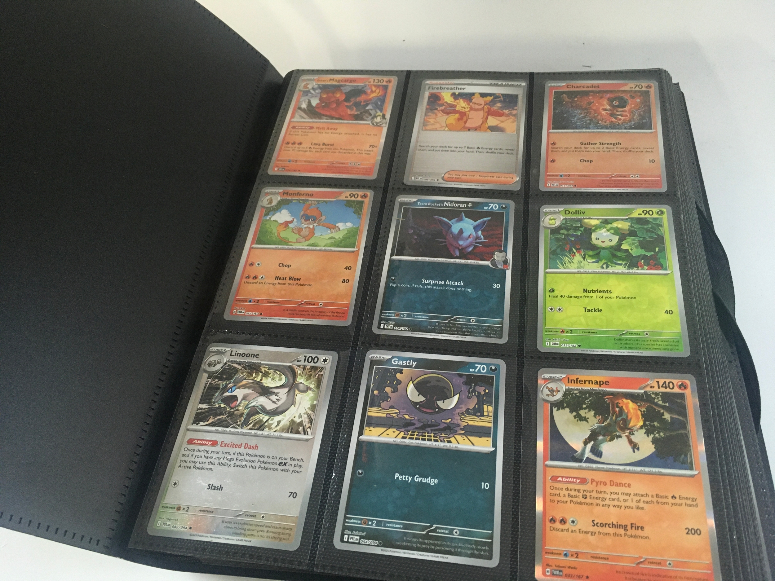 Three albums of modern Pokémon cards (2021-2025) including English and Japanese cards , some holographic . Also including three Titan A.E comics including a signed copy. No reserve