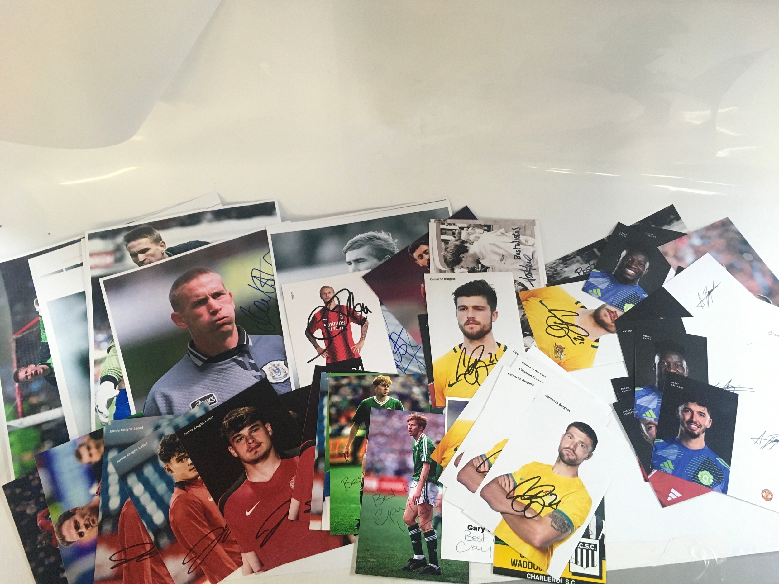 A collection of sports autographs including Football Manchester United players, rugby, Jackie Lewis British formula one driver etc