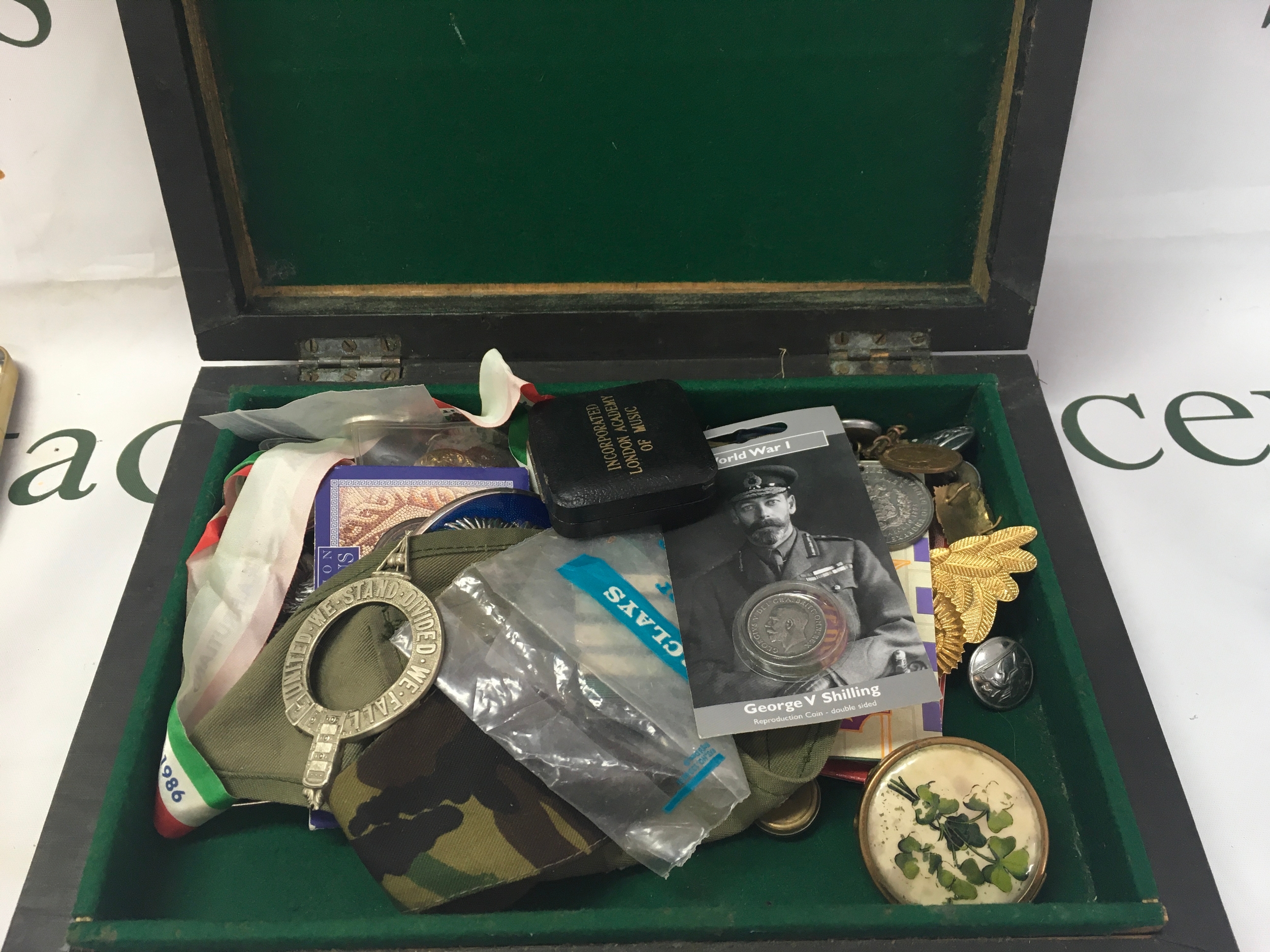A collection of historical memorabilia, medals, tokens, and vintage ephemera. No obvious damage or reconditioning 