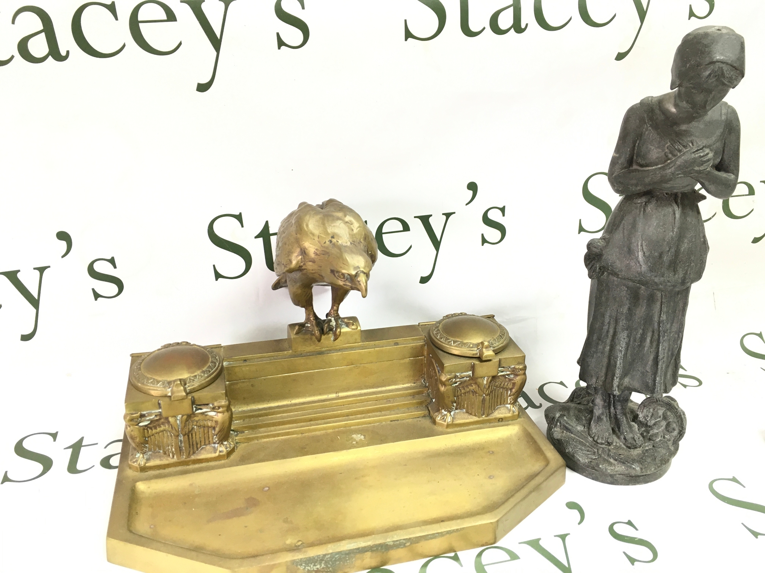 a bronze inkwell with eagle (35cm wide 21cm tall) and a French figure of a lady (35cm tall)