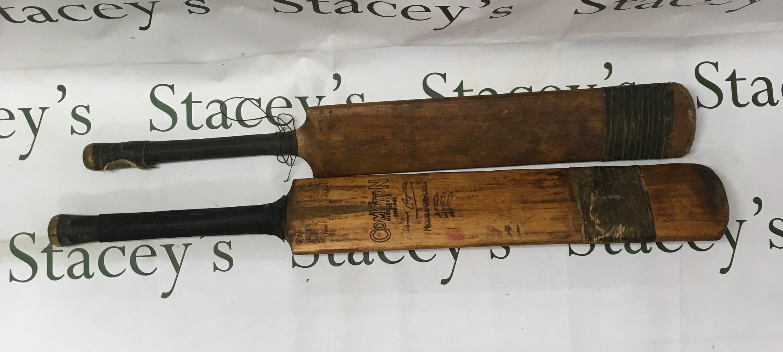 Well worn cricket mid 20th century English willow cricket bats signed by famous cricketing inspirations 