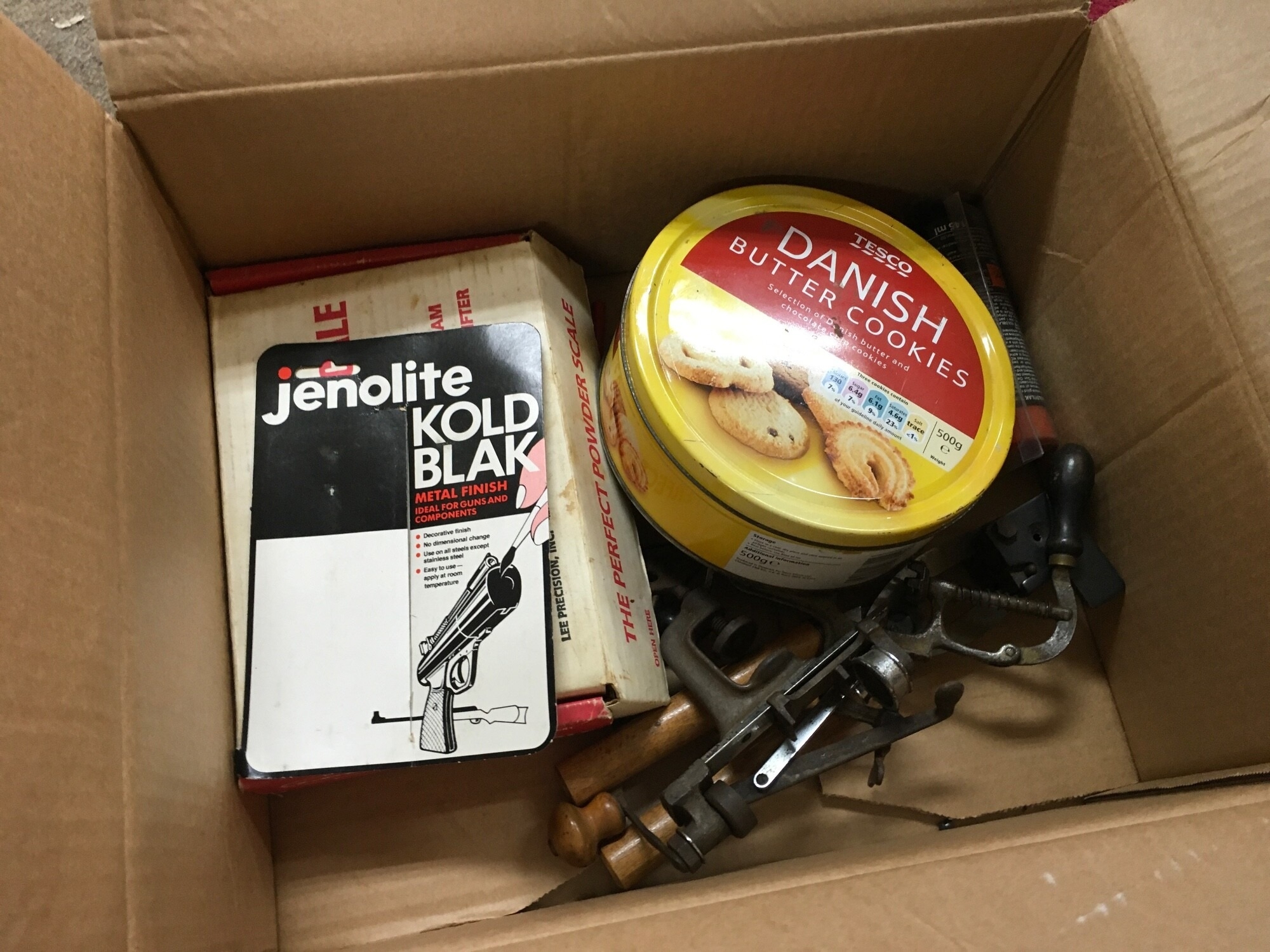 A box of gun cartridge making equipment