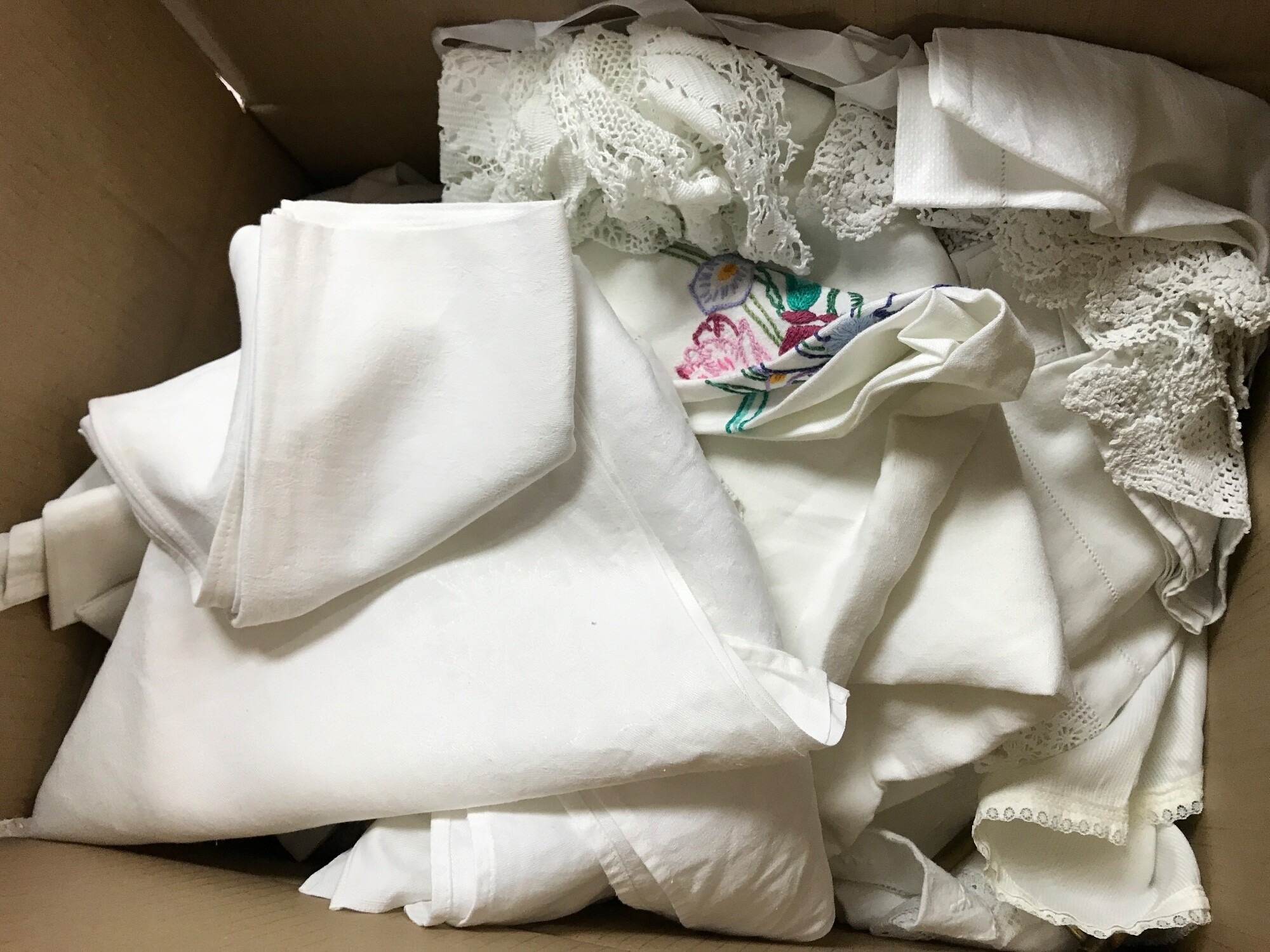 A collection of lace and linen , christening gowns NO RESERVE