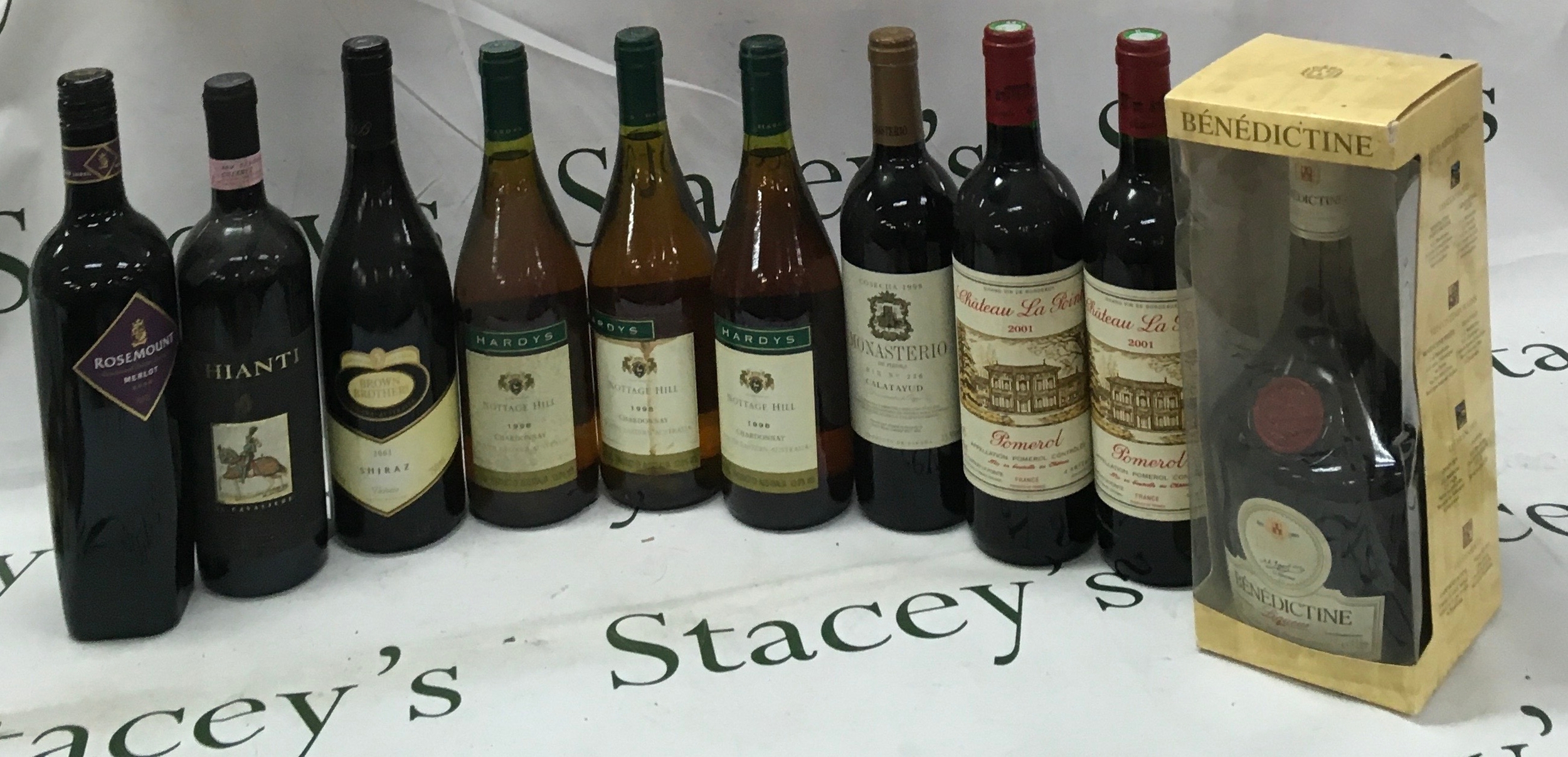 Mixed collection of alcohol (10) including 3 bottles of Harry's Chardonnay, 2 bottles chateau La point etc.