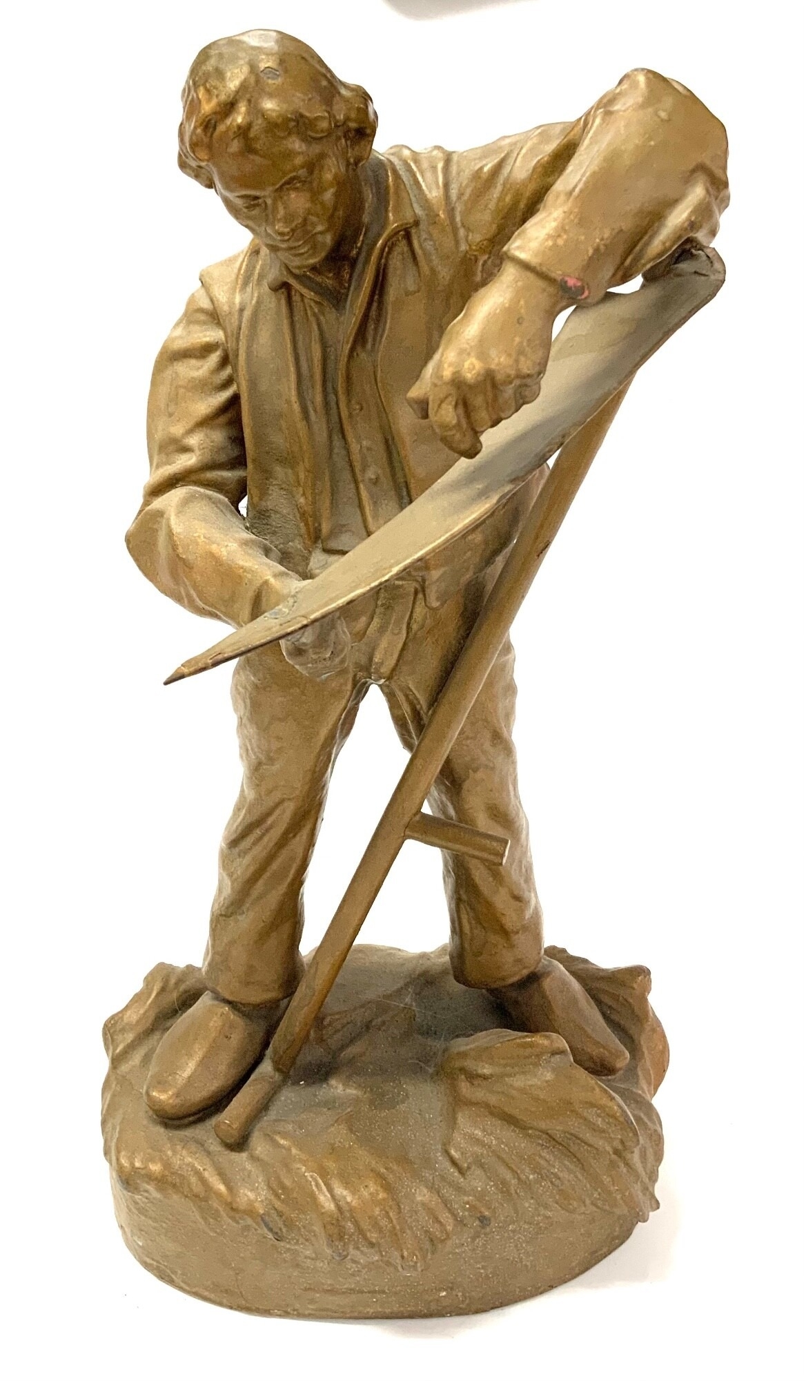 After Hans Muller, filled spelter figure of a harvest man sharpening his scyth, 37.5cm NO RESERVE