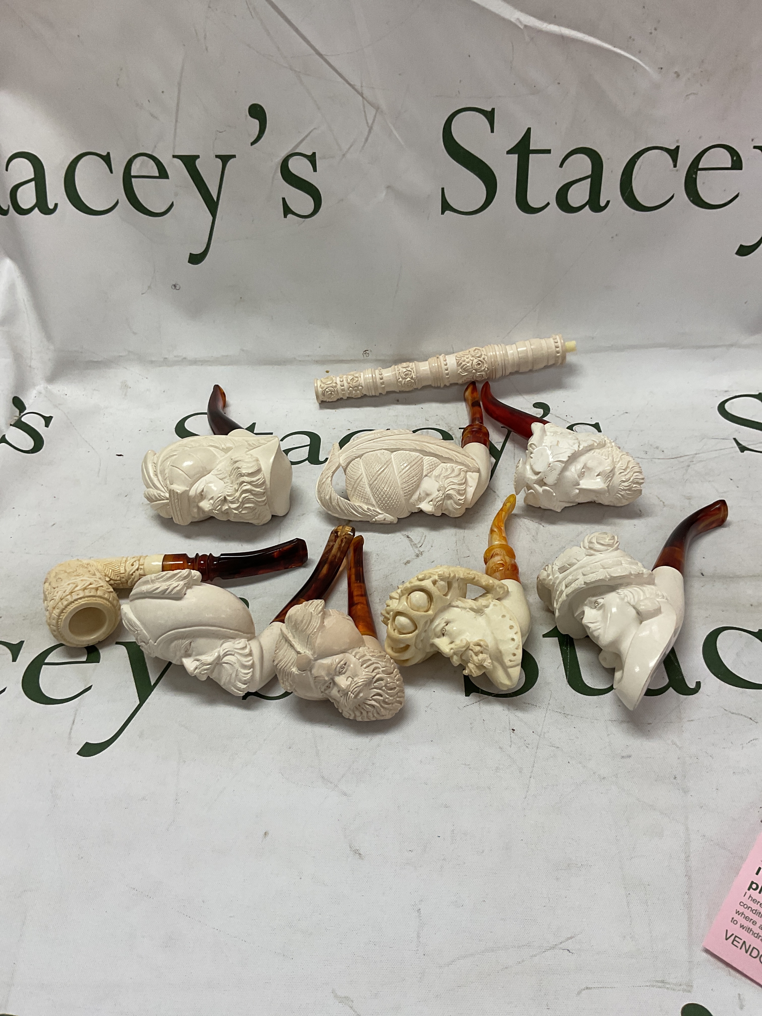 Eight Meerschaum pipes, mainly new some with labels. All unused clean bowls.