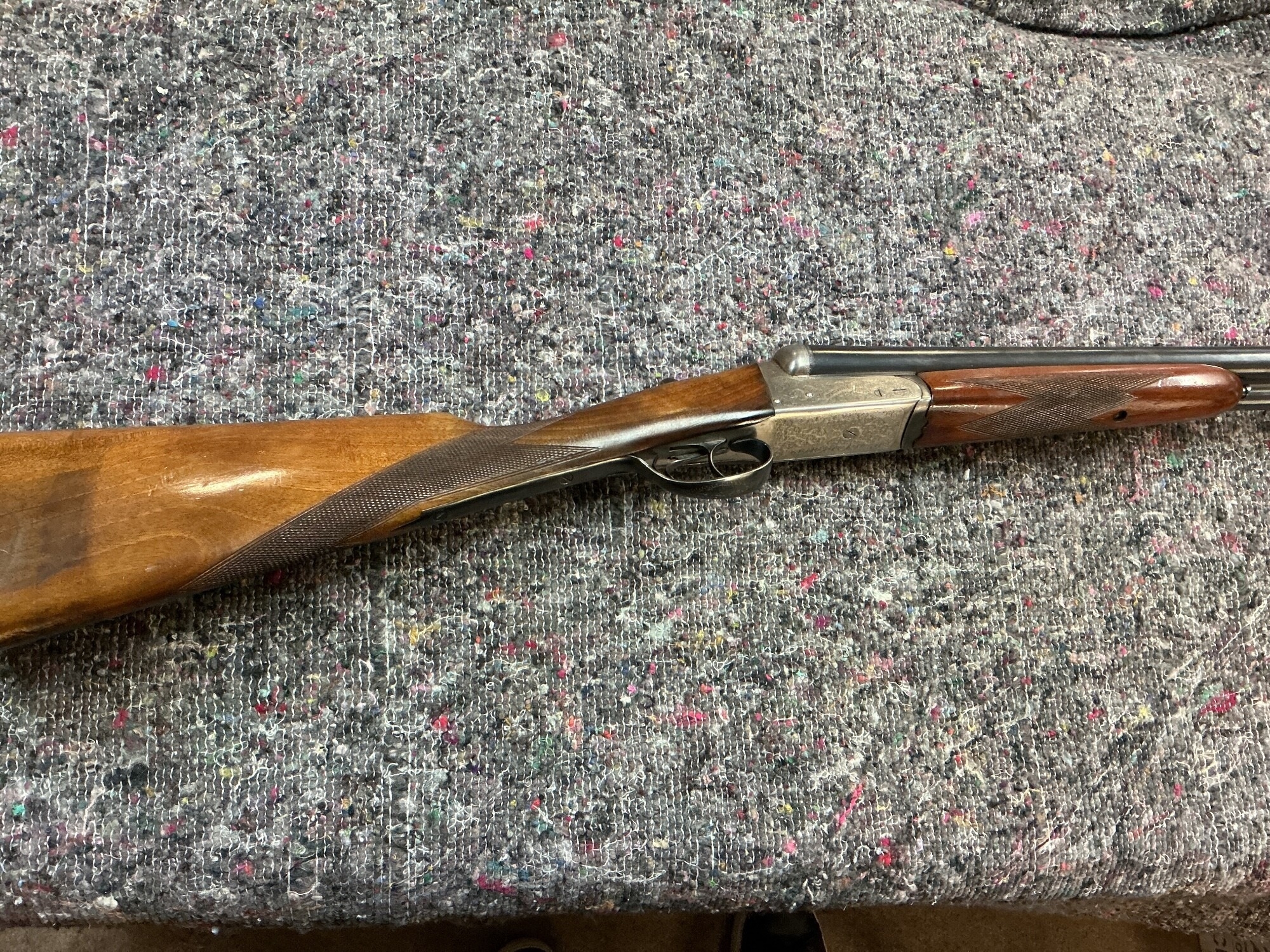 kestral 12g side by side shotgun with fixed chokes. Right handed 27.5 inch barrel. Serial number 276872 Please note that a shotgun license is required to purchase this lot. Viewing and collection is by appointment only. NO RESERVE