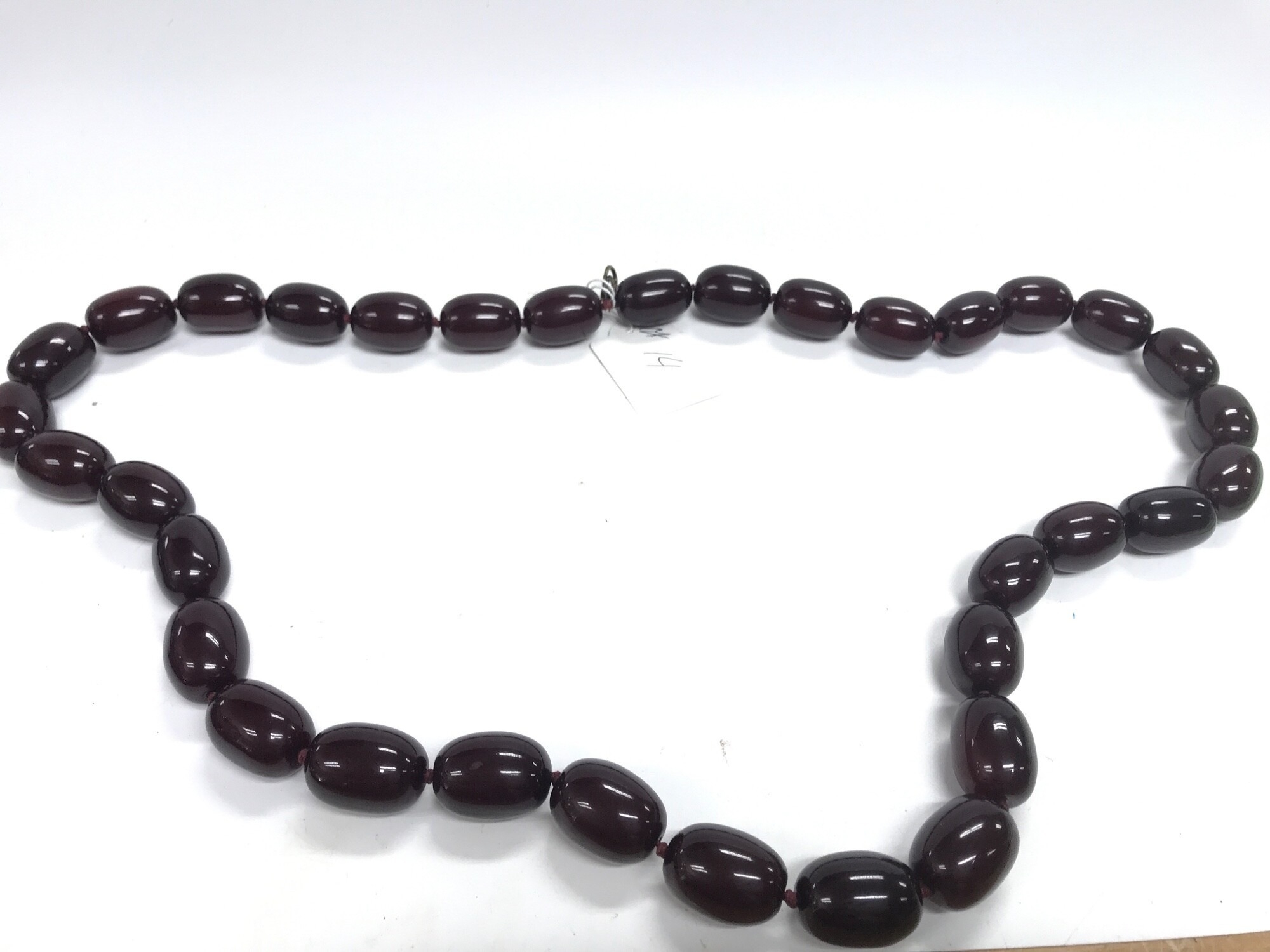 A large necklace in style of amber or Bakelite , not tested . 112cm, 335g