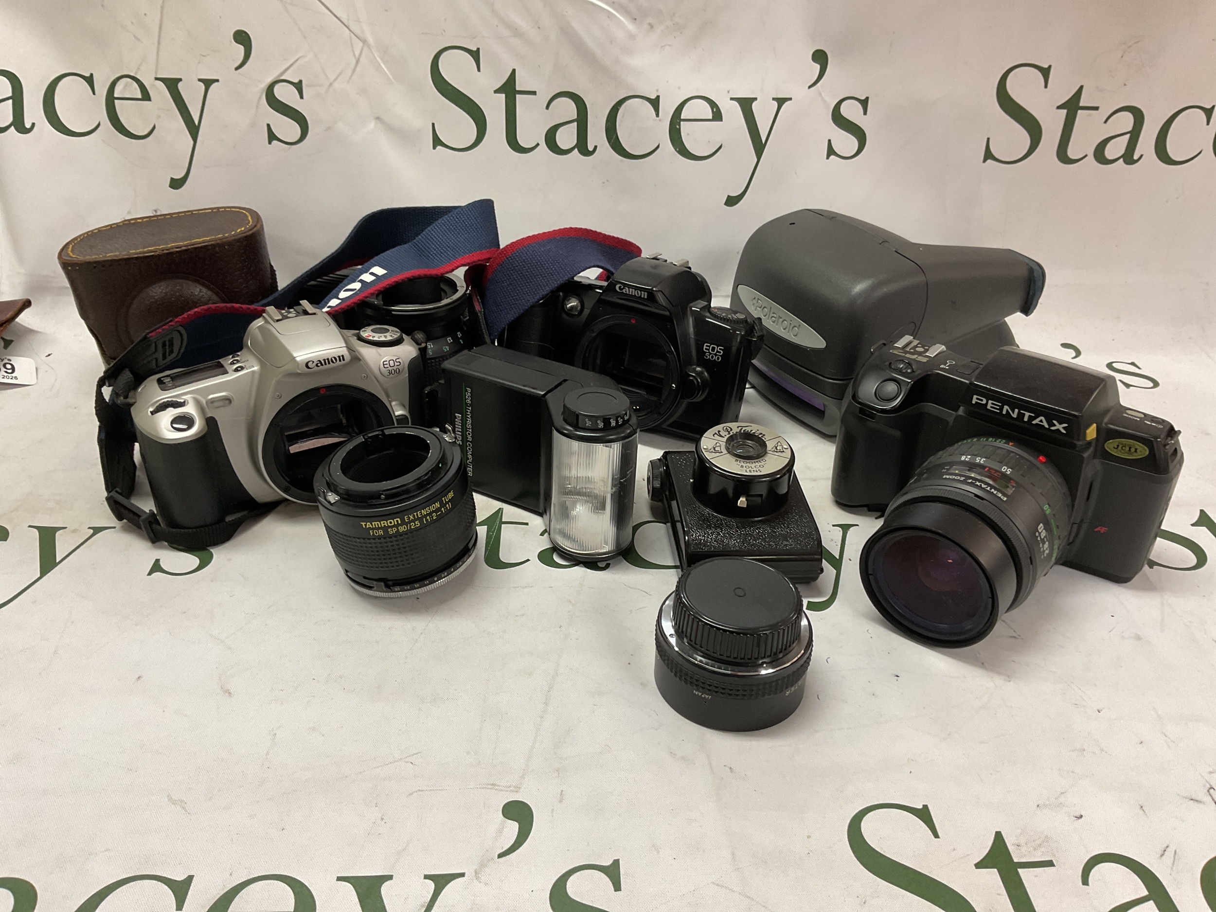 Collection of cameras and lenses to inc Pentax and Canon.