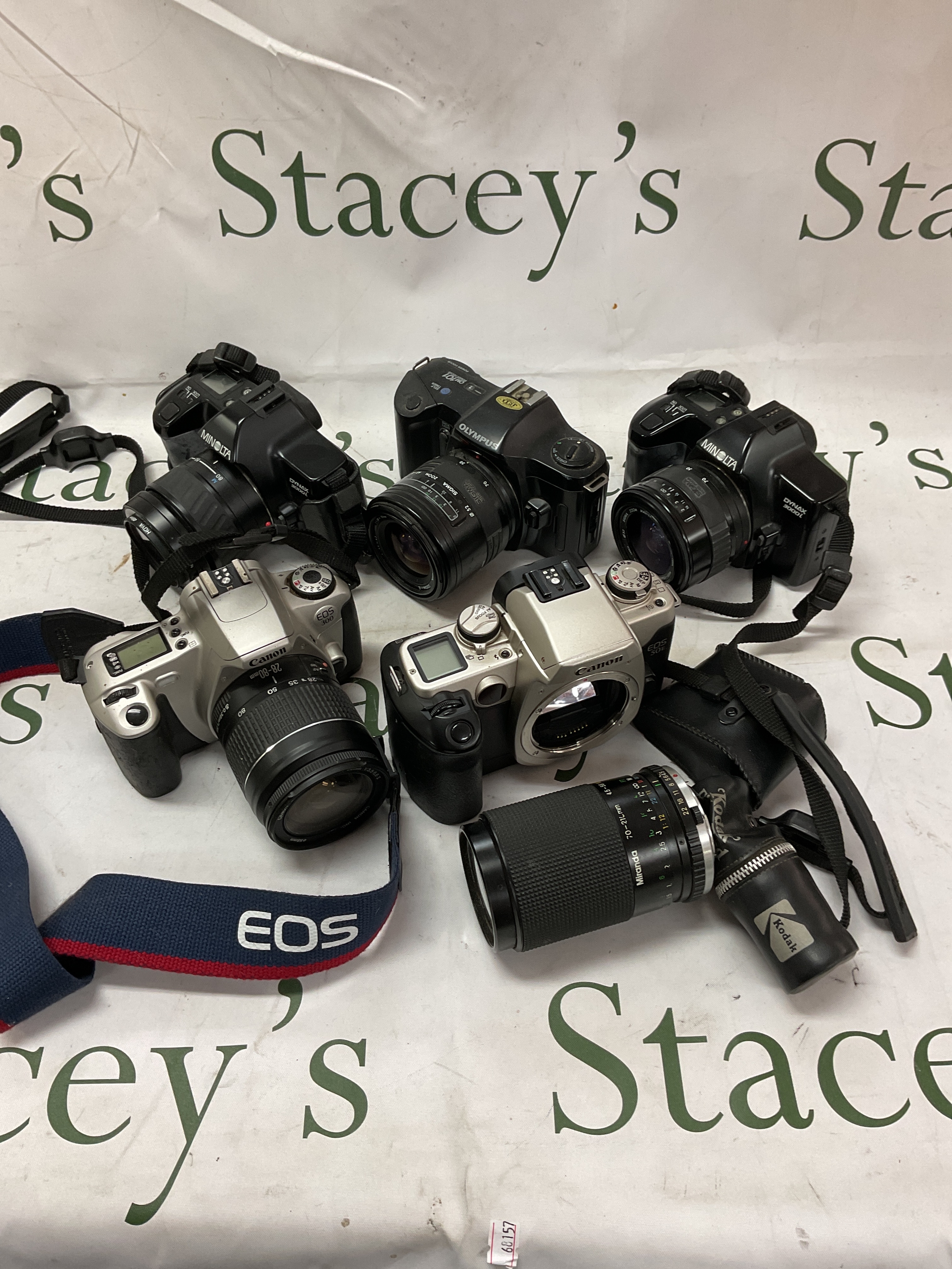 Five various 35mm SLR cameras Olympus, Minolta and Canon.
