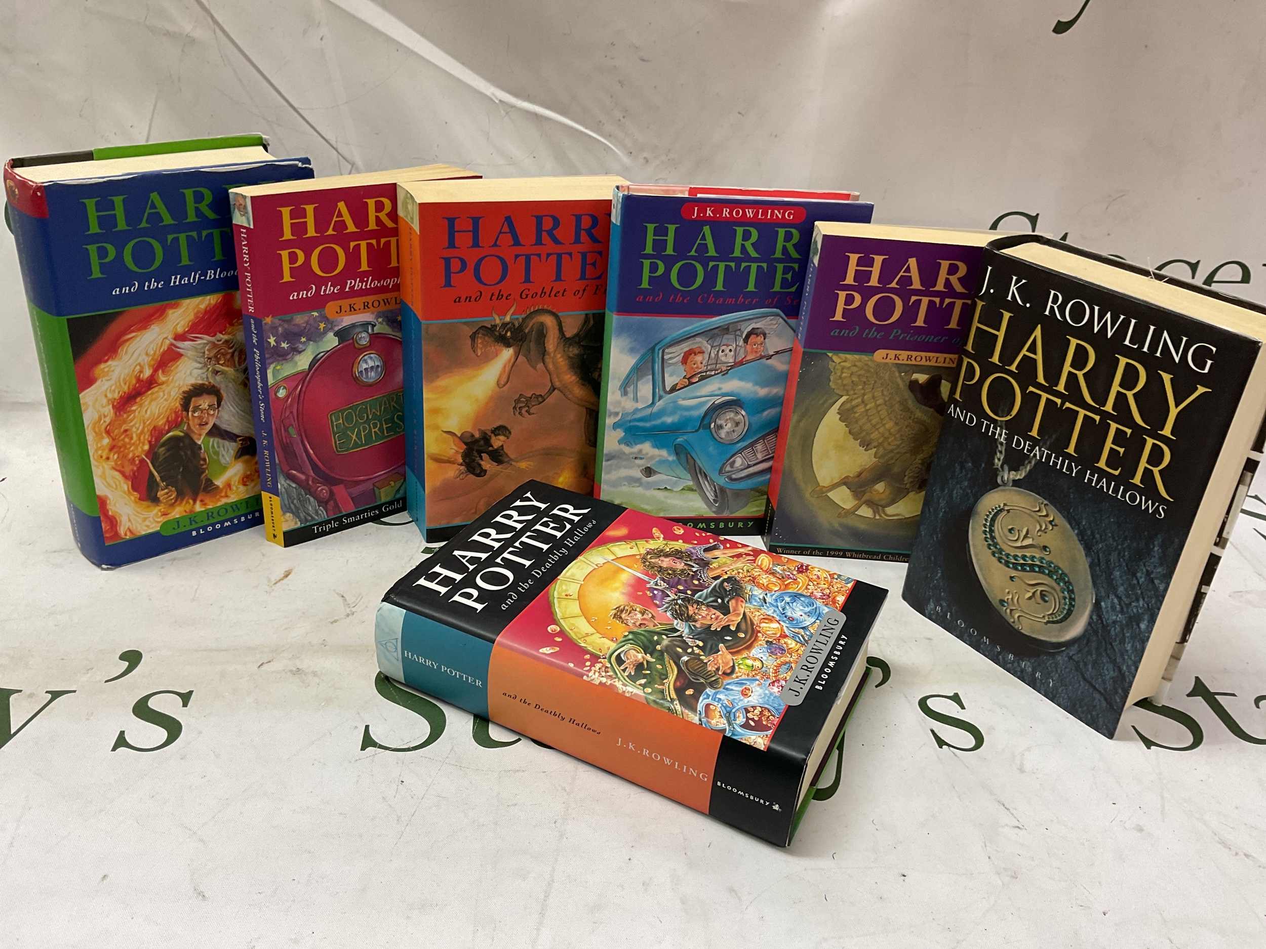 Seven Harry Potter books, three 1st Ed, rare 2005 Half Blood Prince with errors page 99stating eleven owls not ten.