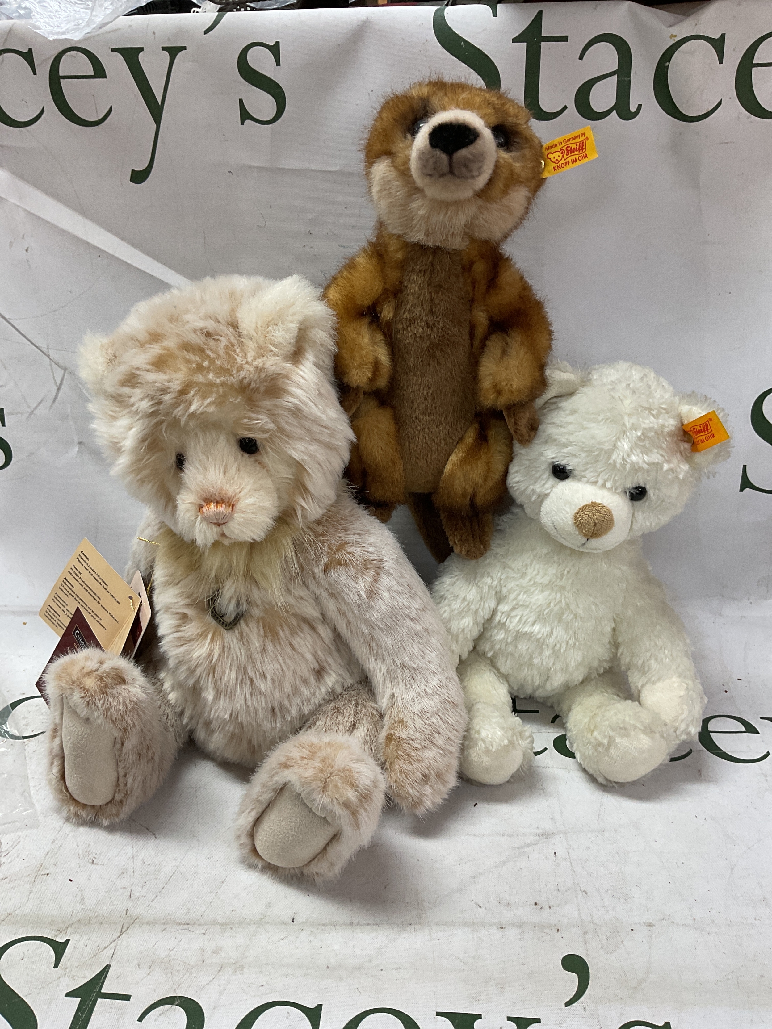 Steiff polar bear and Meerkat along with a Charlie Bear.