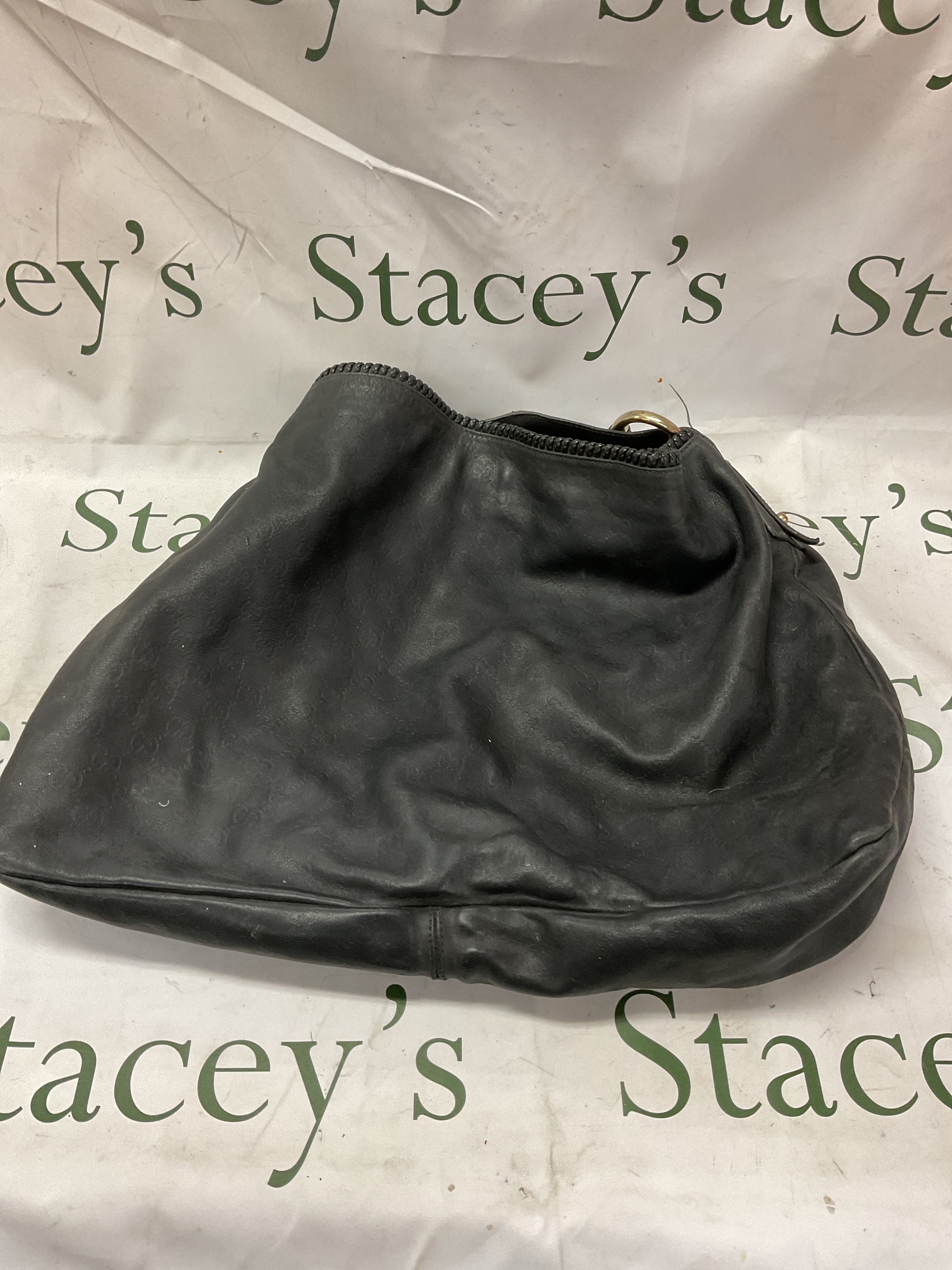 Gucci horse bit large bucket bag, black leather. Minor damage to bit joint.