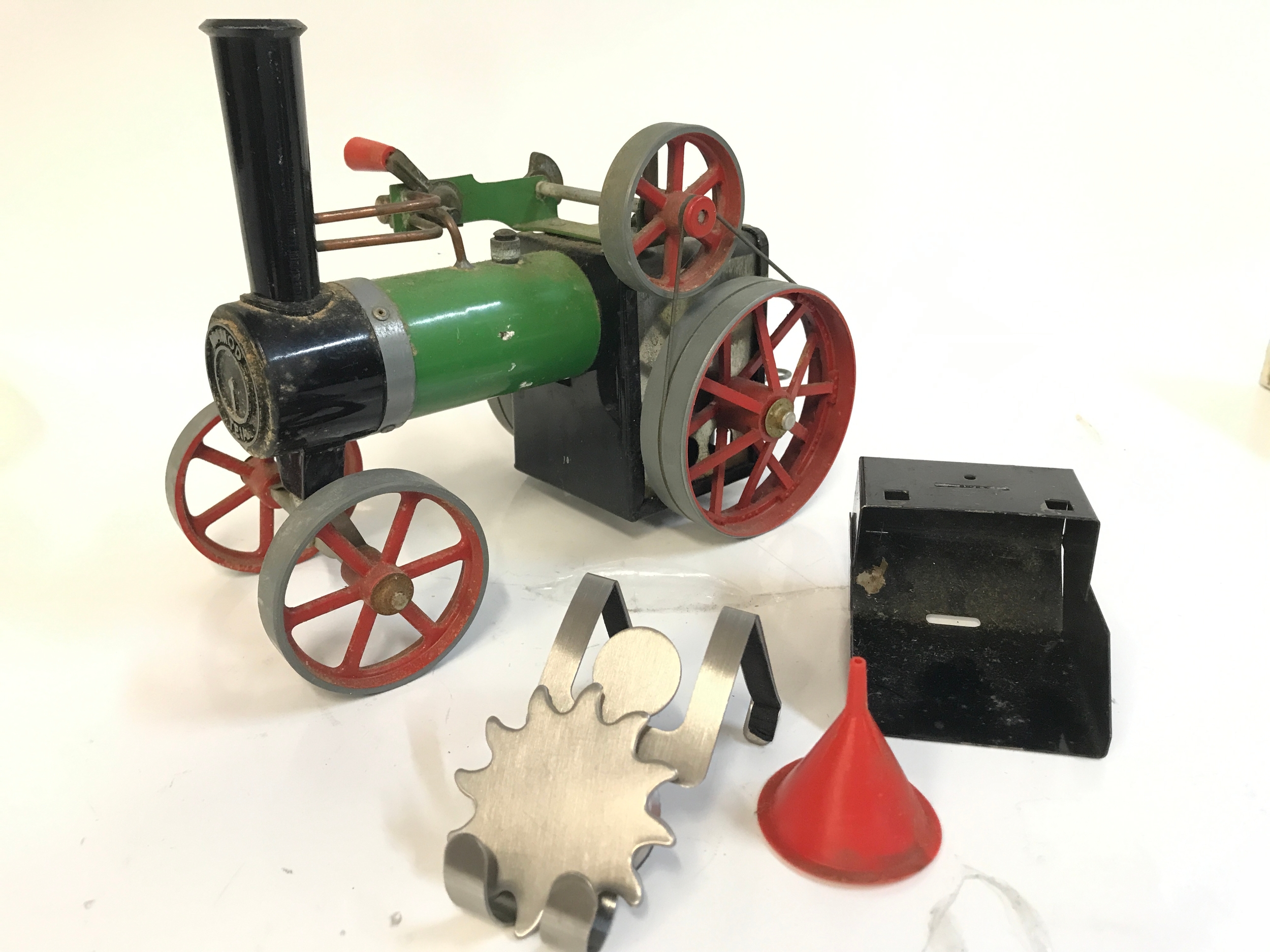 A Mamod engine and a Russian tin plate toy