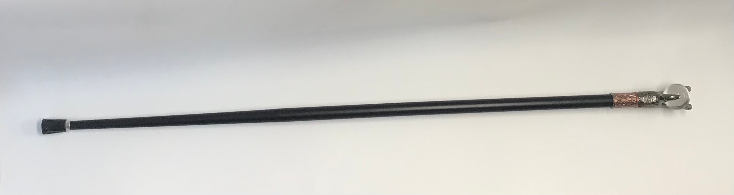 Decorative walking stick handle.