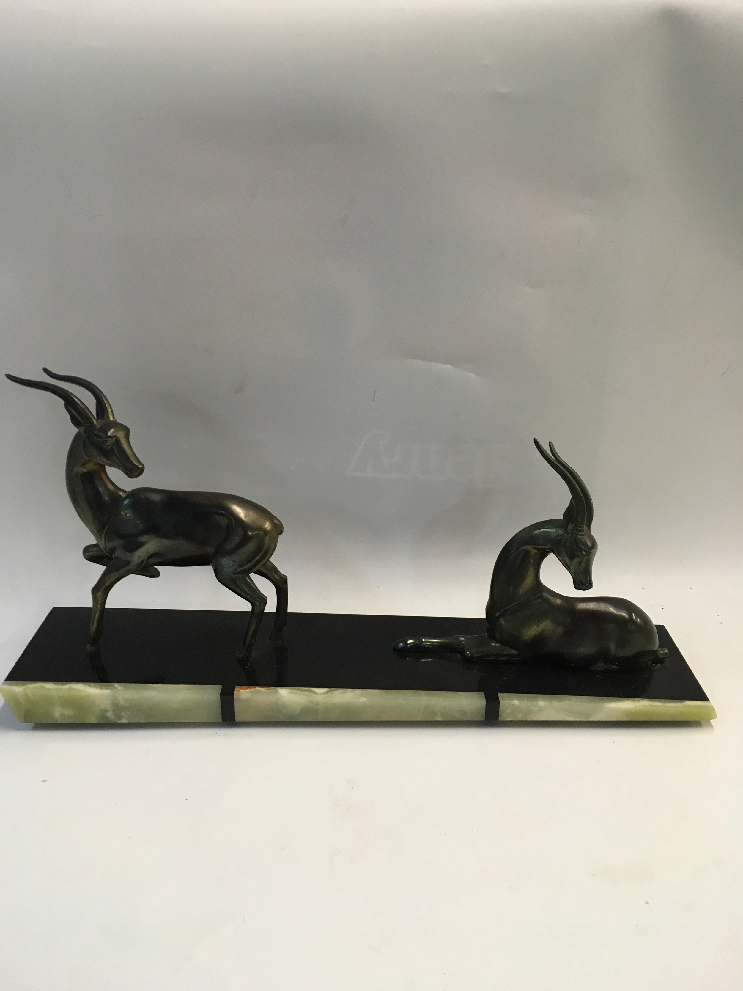 Art Deco slope style onyx base with two antelopes 