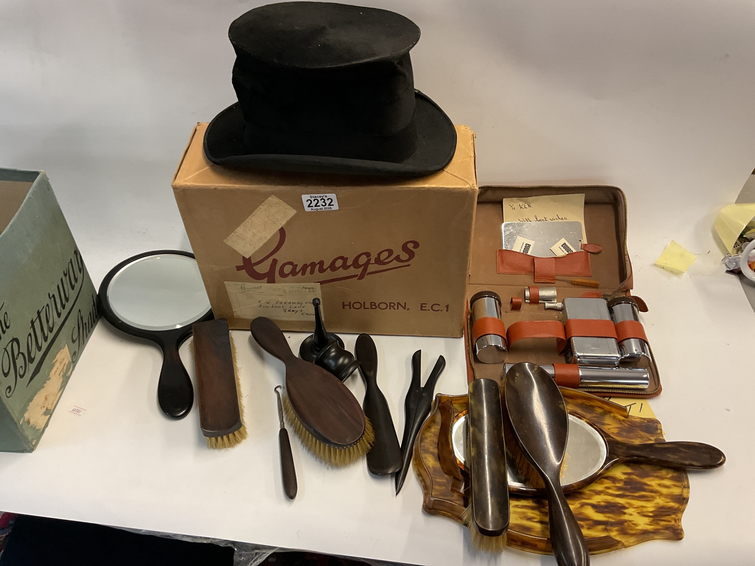 Boxed top hat a little crushed, along with vanity sets.