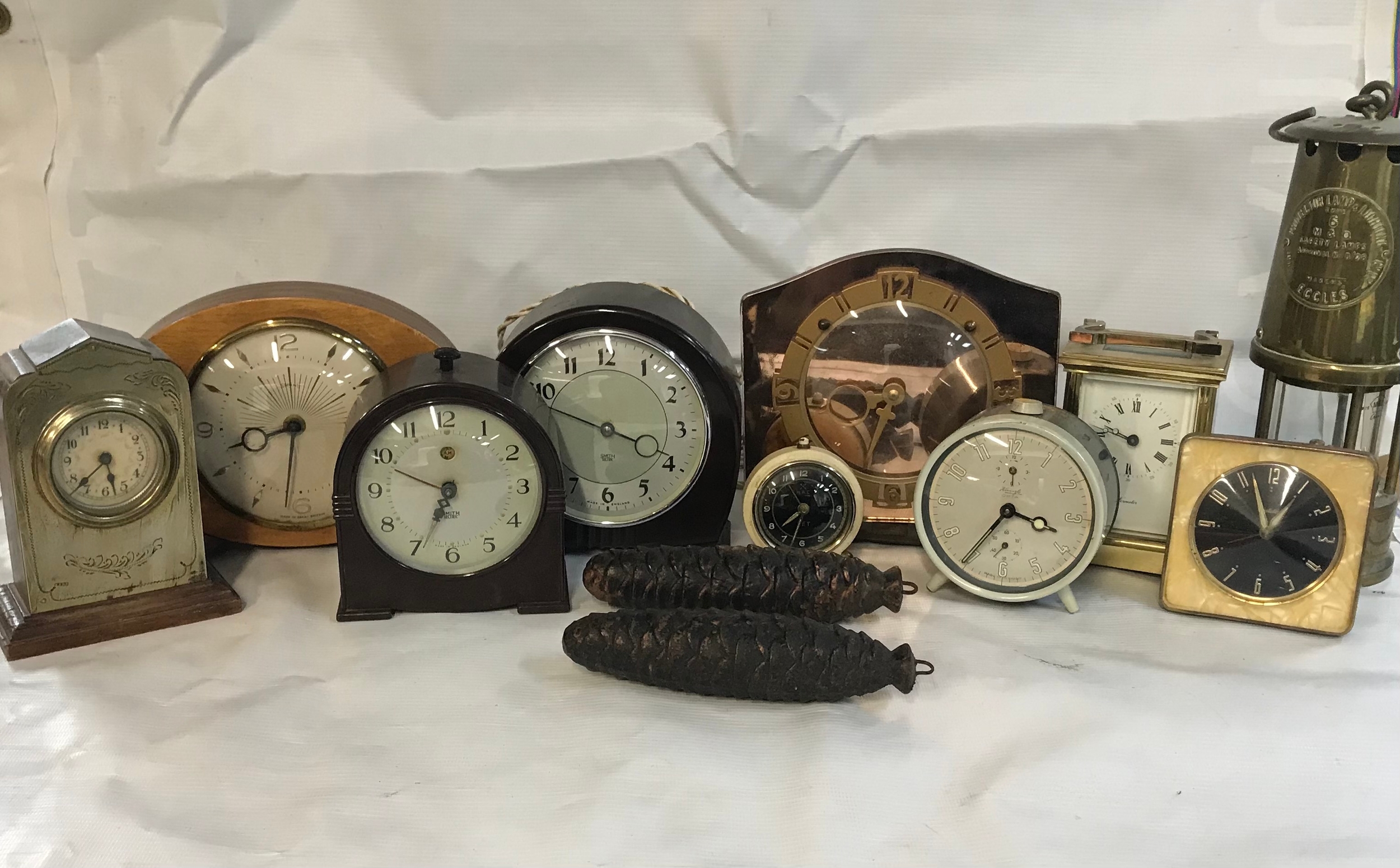 Quantity of clocks including miners lamp clock and 2 wall clocks