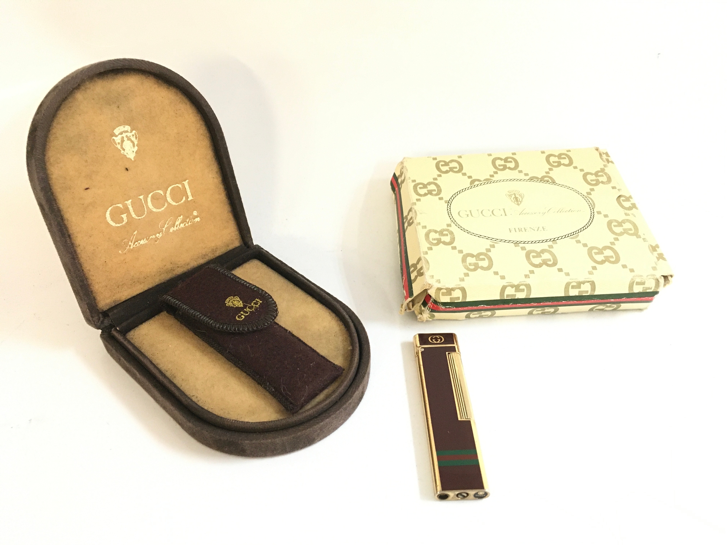 A boxed Gucci lighter , no reserve