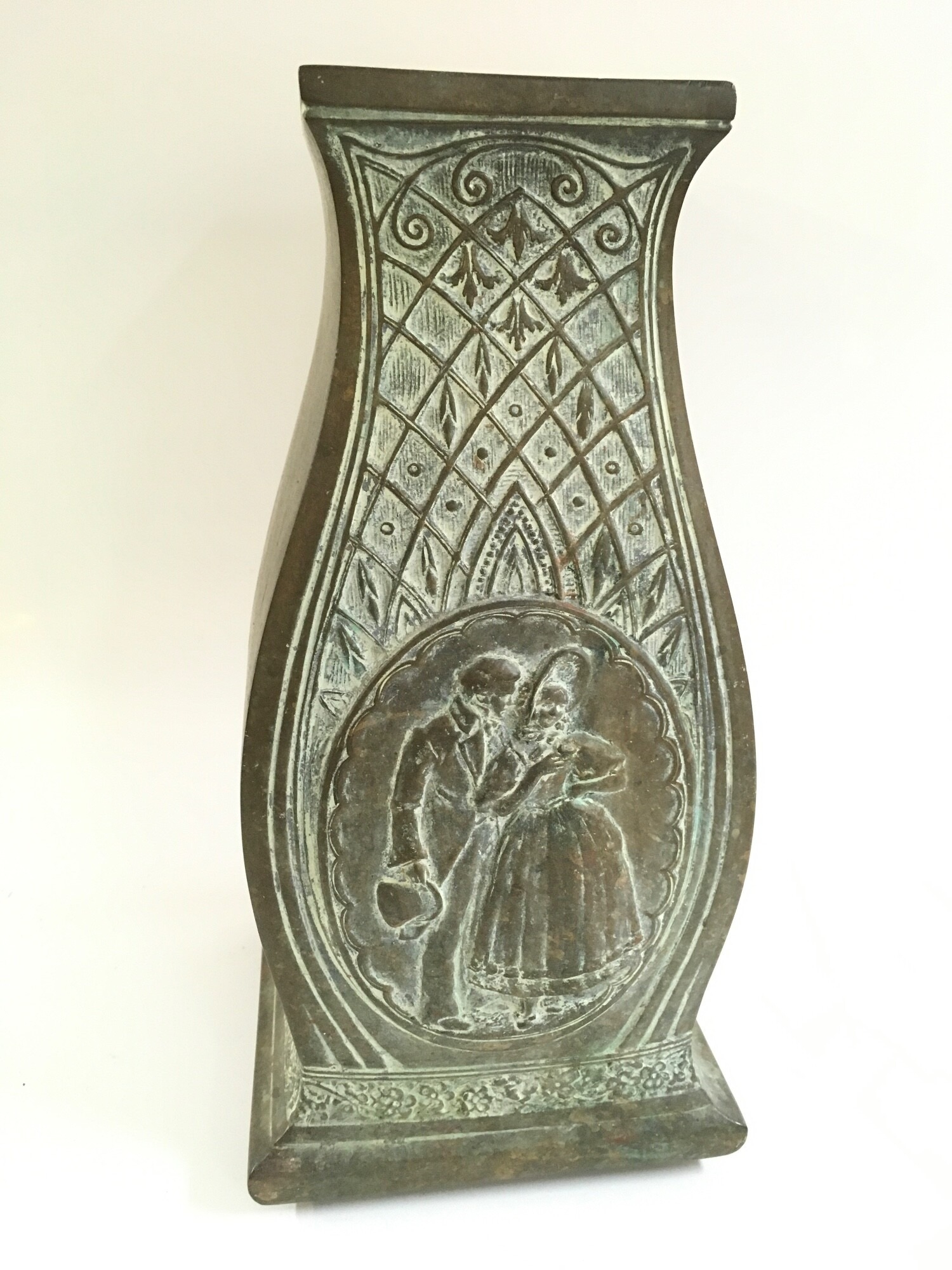 A bronze vase signed K.Schwartz with Major Quality and Mrs Street design, image later taken and used for Quality Street. 31cm tall