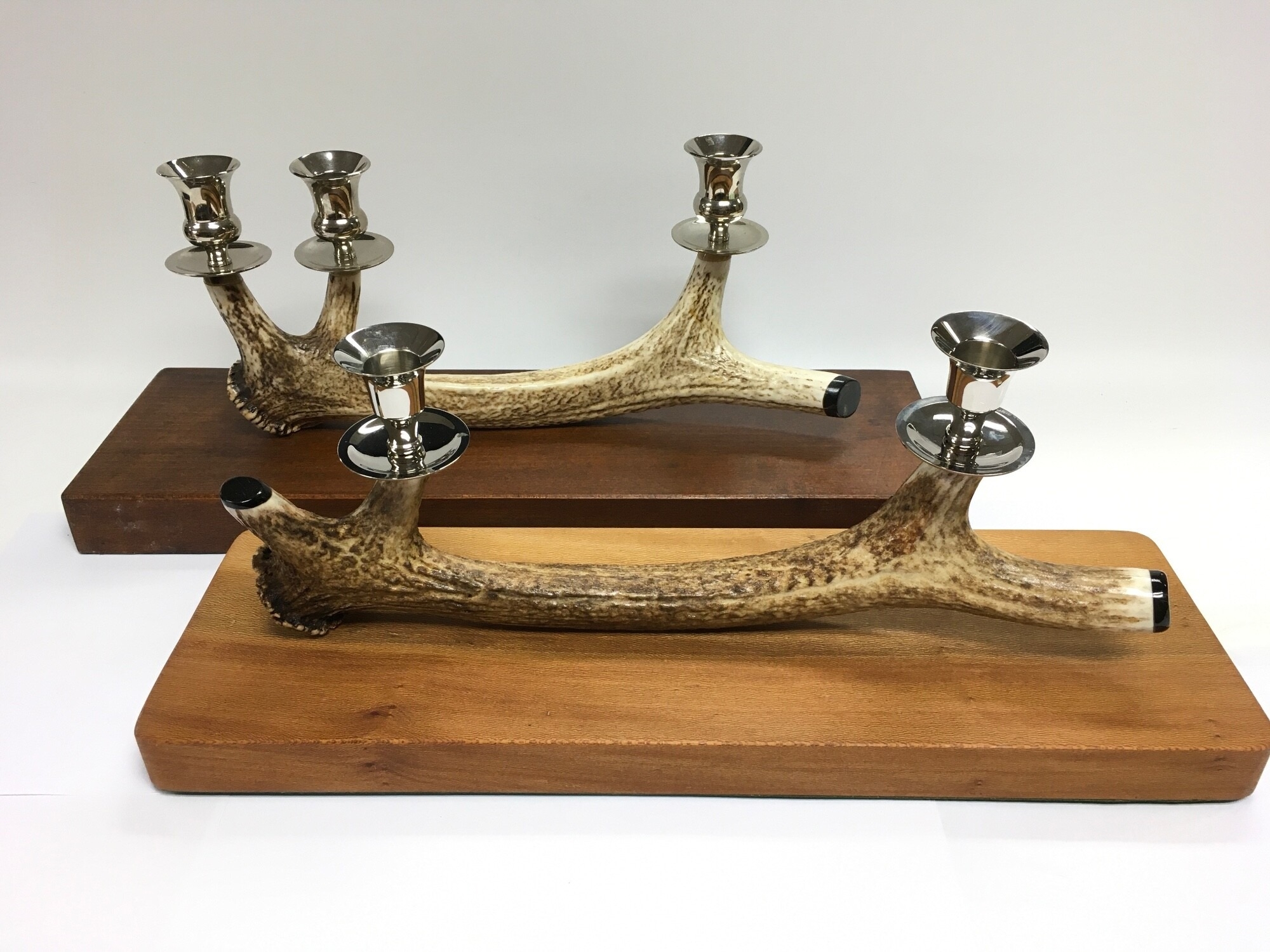 Two antler horn candlesticks, approx lengths 48cm and 46cm. NO RESERVE