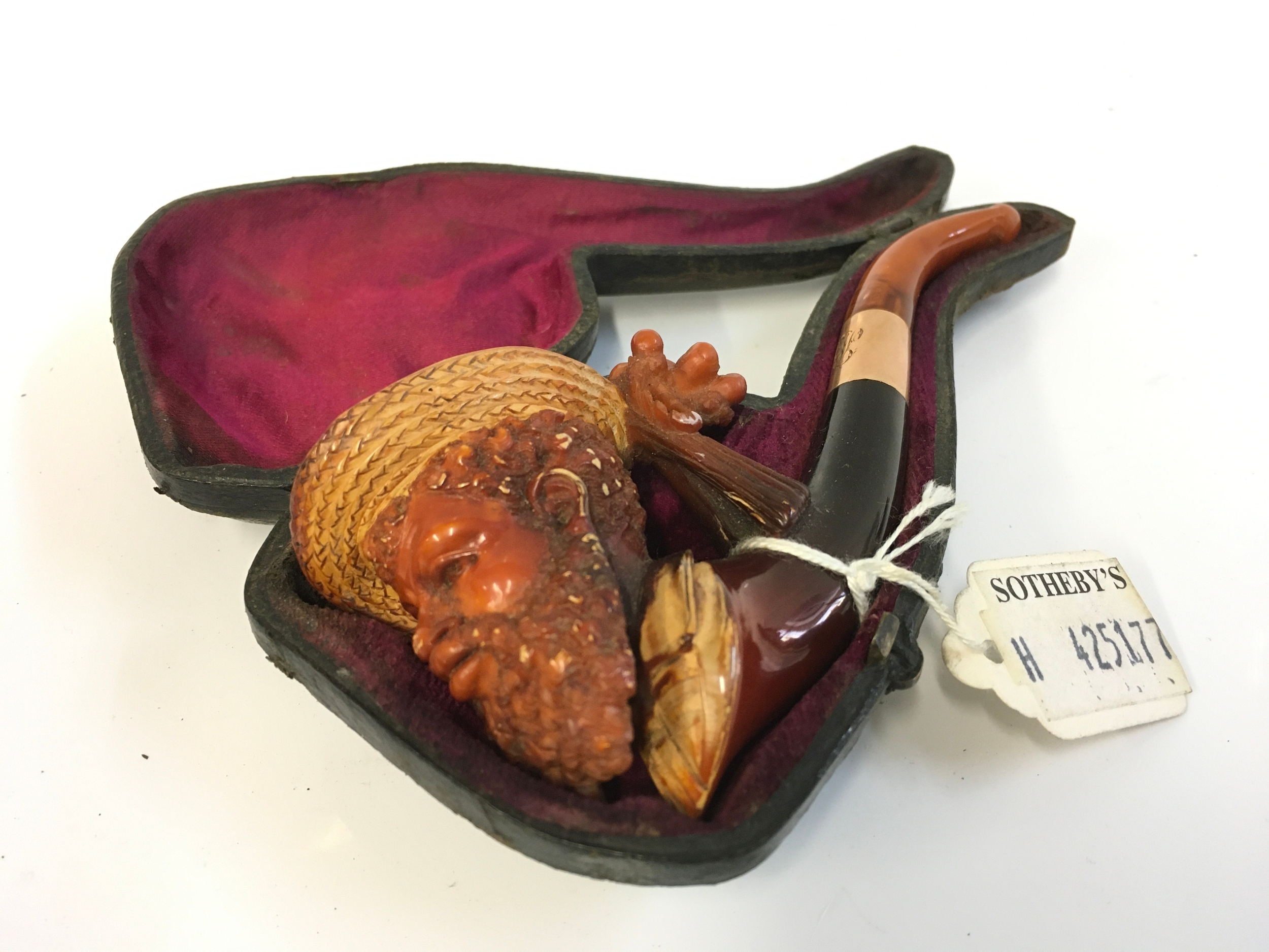 A cased Meerschaum tobacco pipe, African man with a beard and hat design. 13cm long
