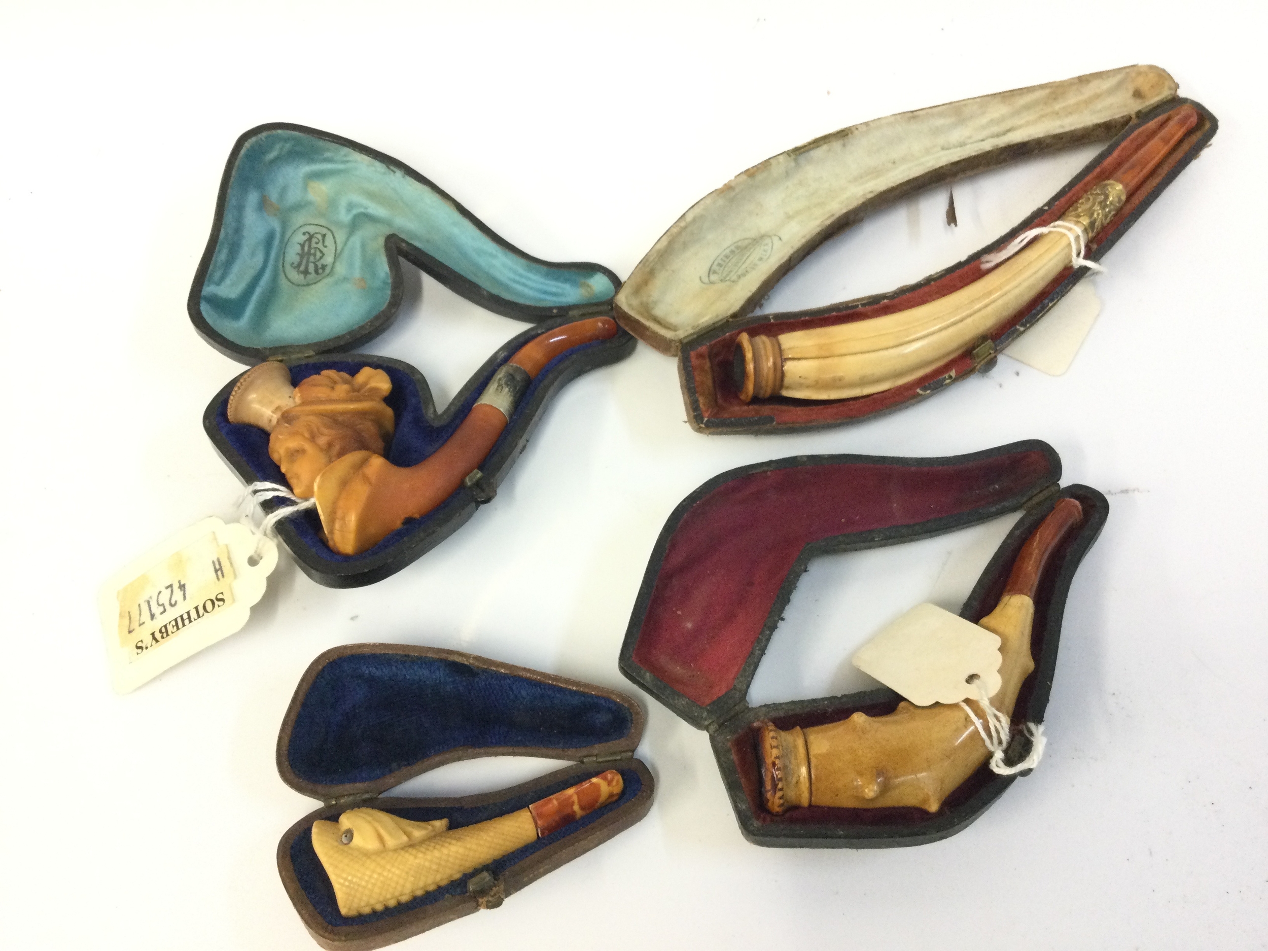 Four cased meerschaum tobacco pipes. 6 to 14.5cm long