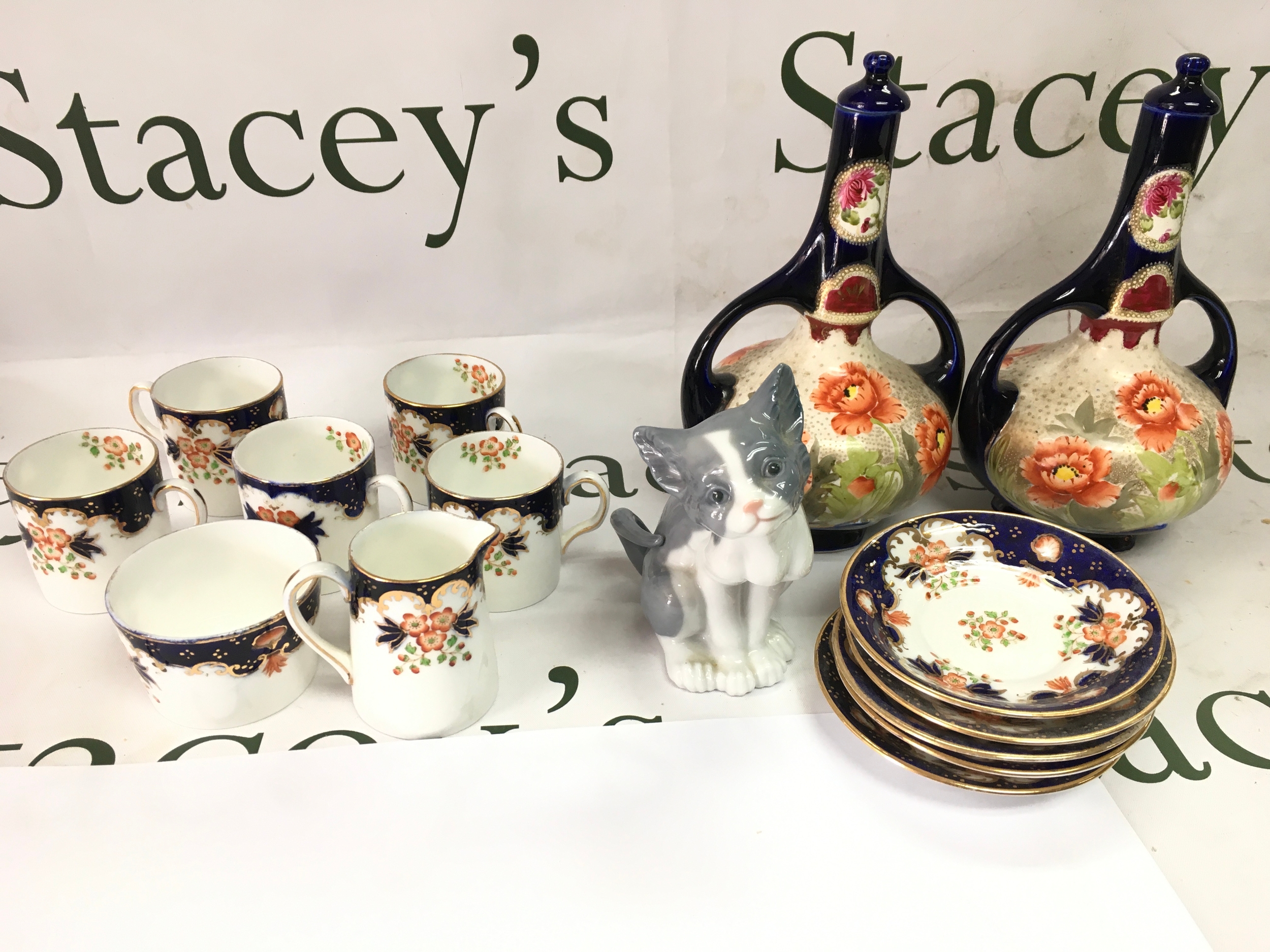 A Lladro cat small vases and a new Chelsea coffee set