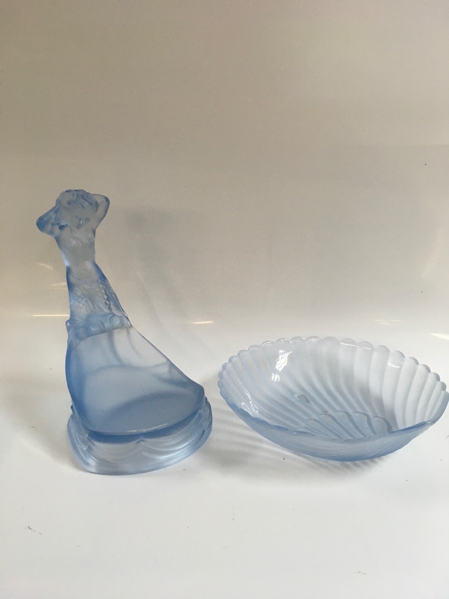 An Art Deco style frosted blue satin glass centrepiece consisting of a figural centrepiece insert nested inside a matching scalloped bowl NO RESERVE
