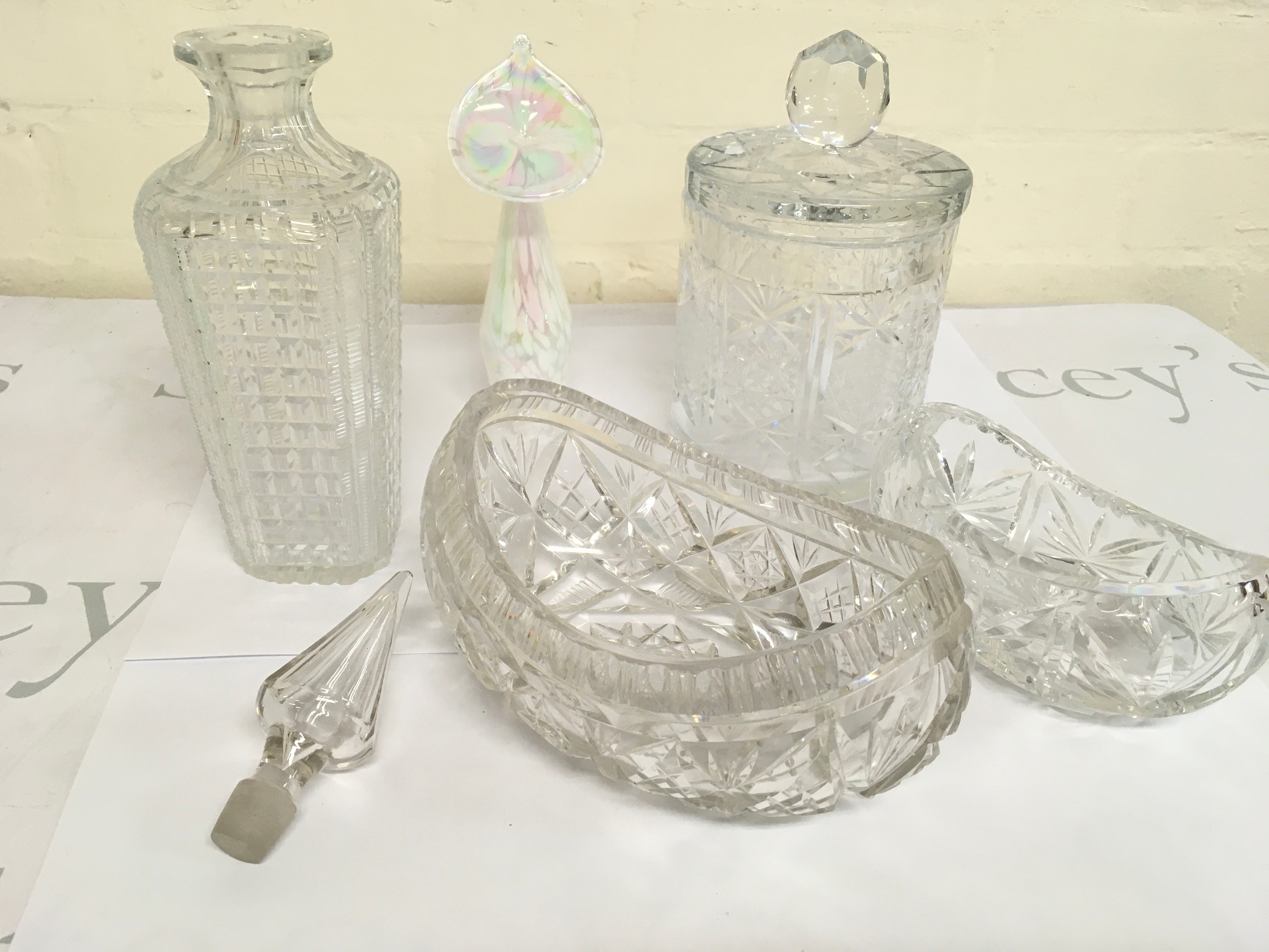Collective lot of glass items including vintage square-cut glass decanter, biscuits container etc