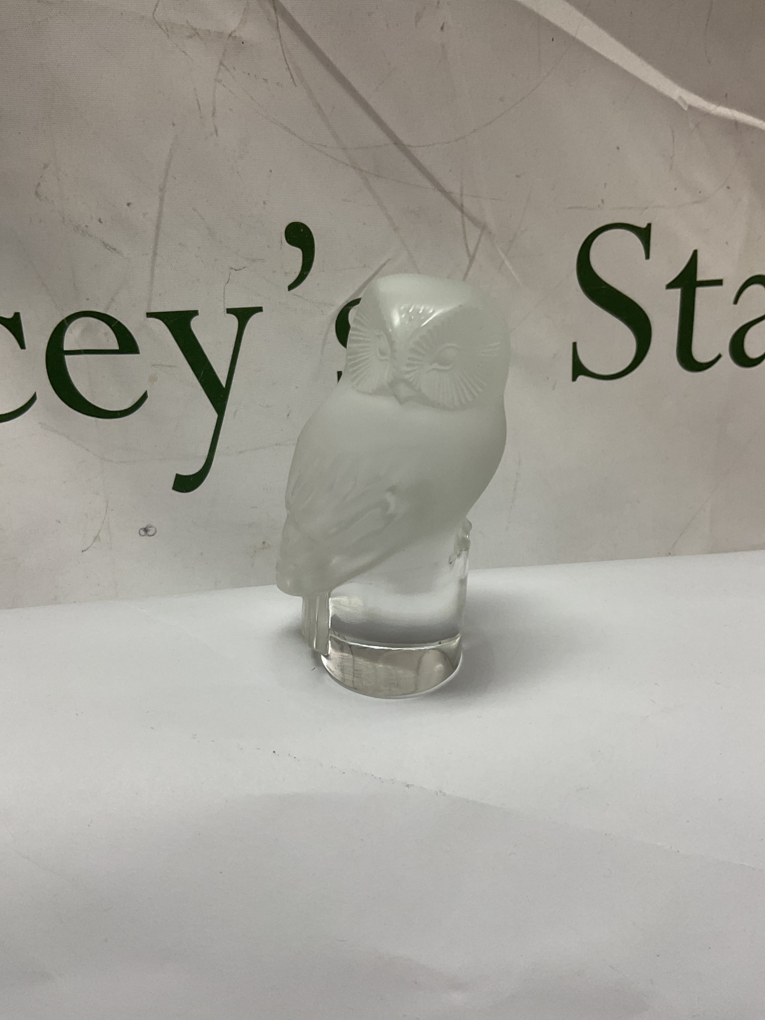 Lalique Owl figure on cylindrical base, signed Lalique France. H8 cm