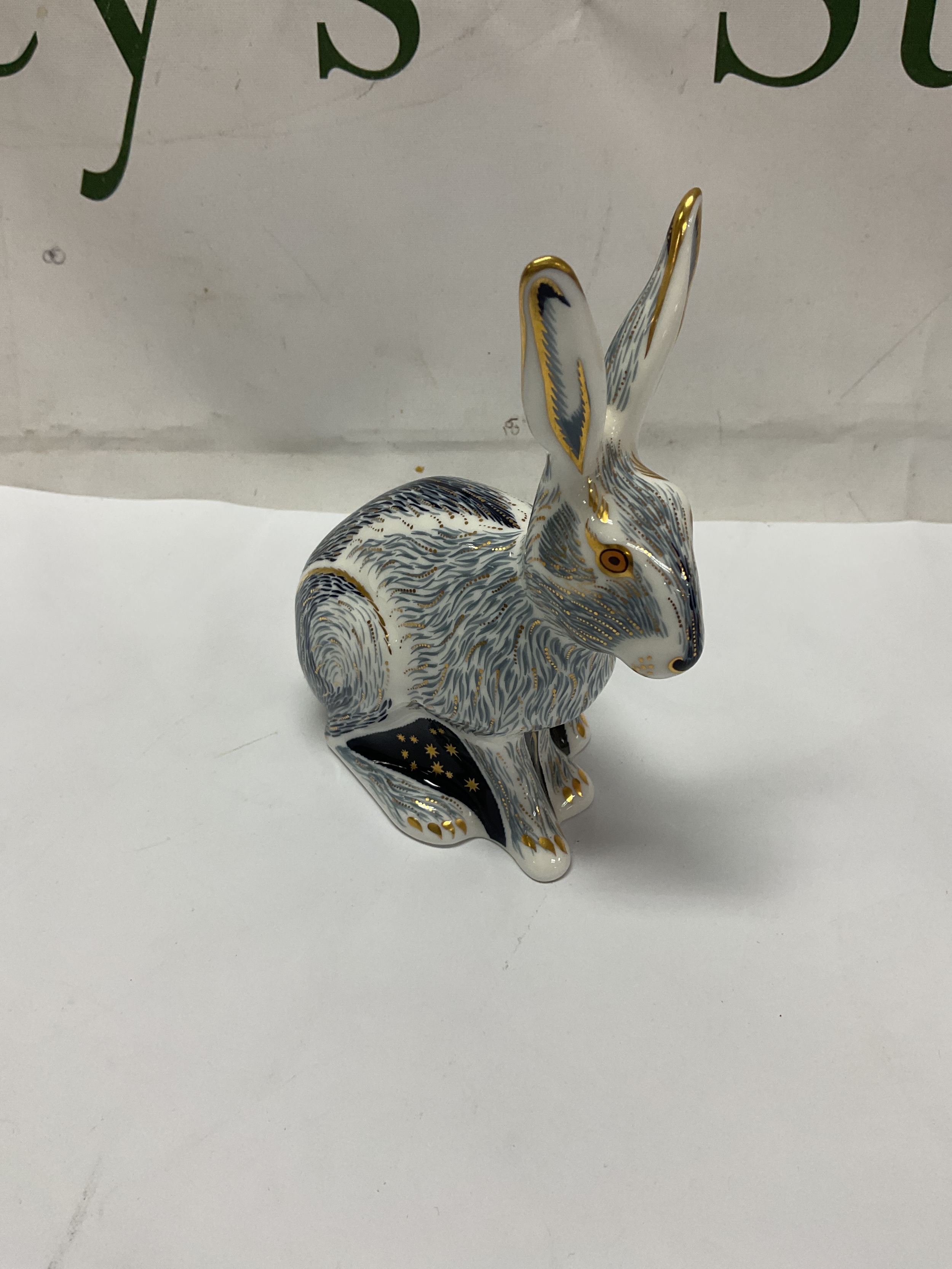 Royal Crown Derby gold button figure of a Hare, Starlight Hare for the collectors club 2002. H13 cm x W 10cm.