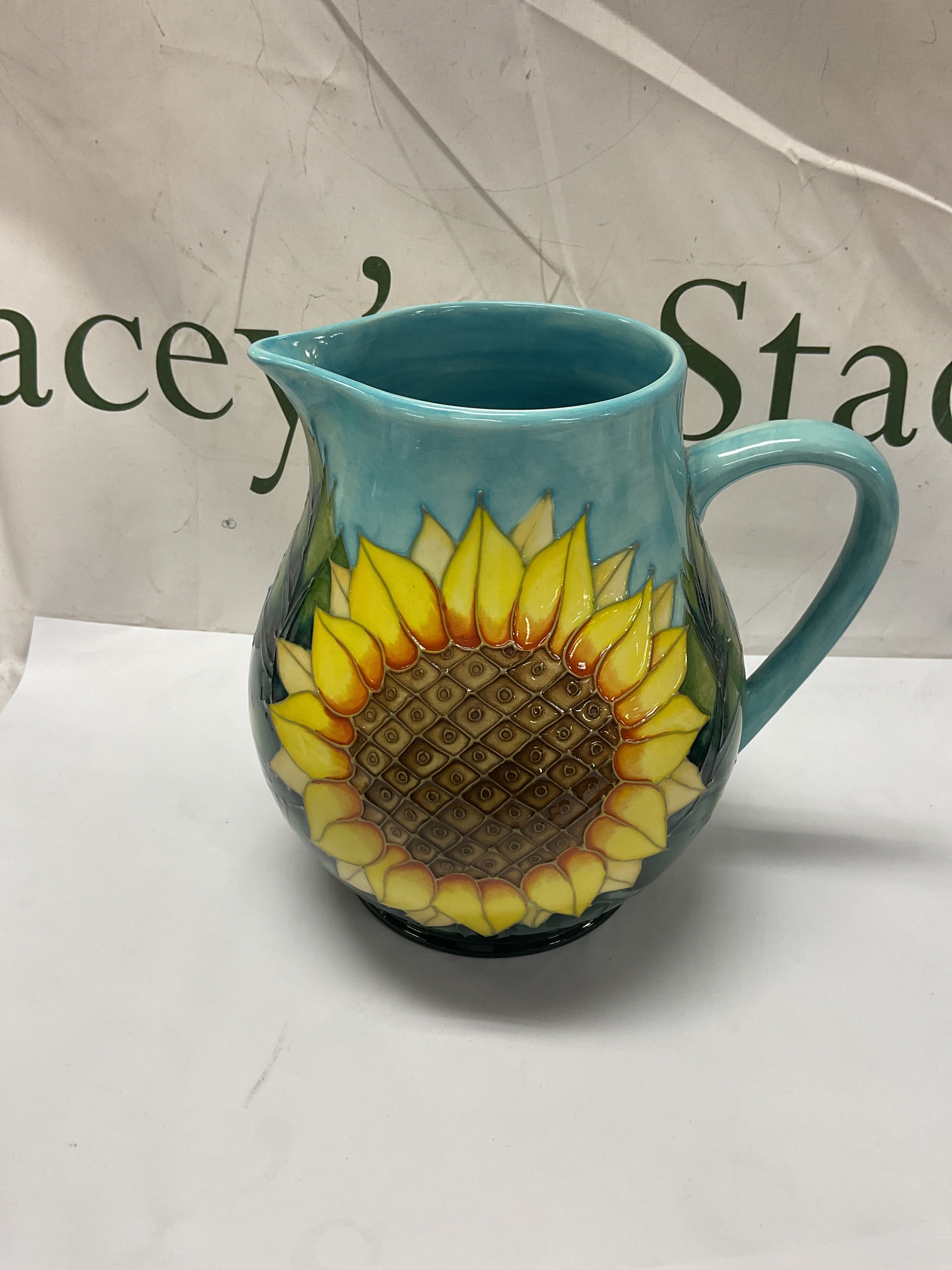 Moorcroft large sunflower jug design by Sally Tuffin. H19cm.
