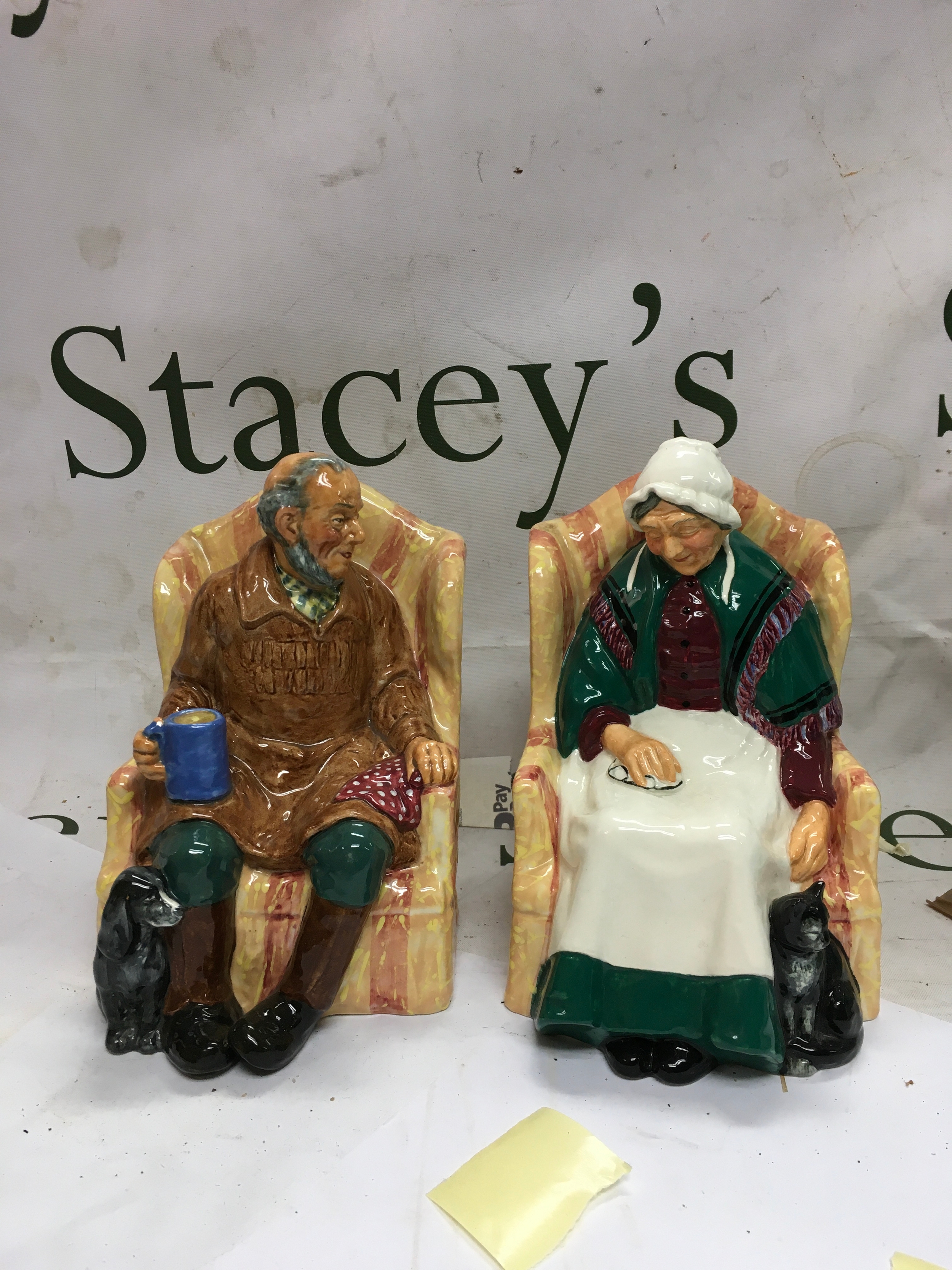 A pair of Royal Doulton ceramic figures. 