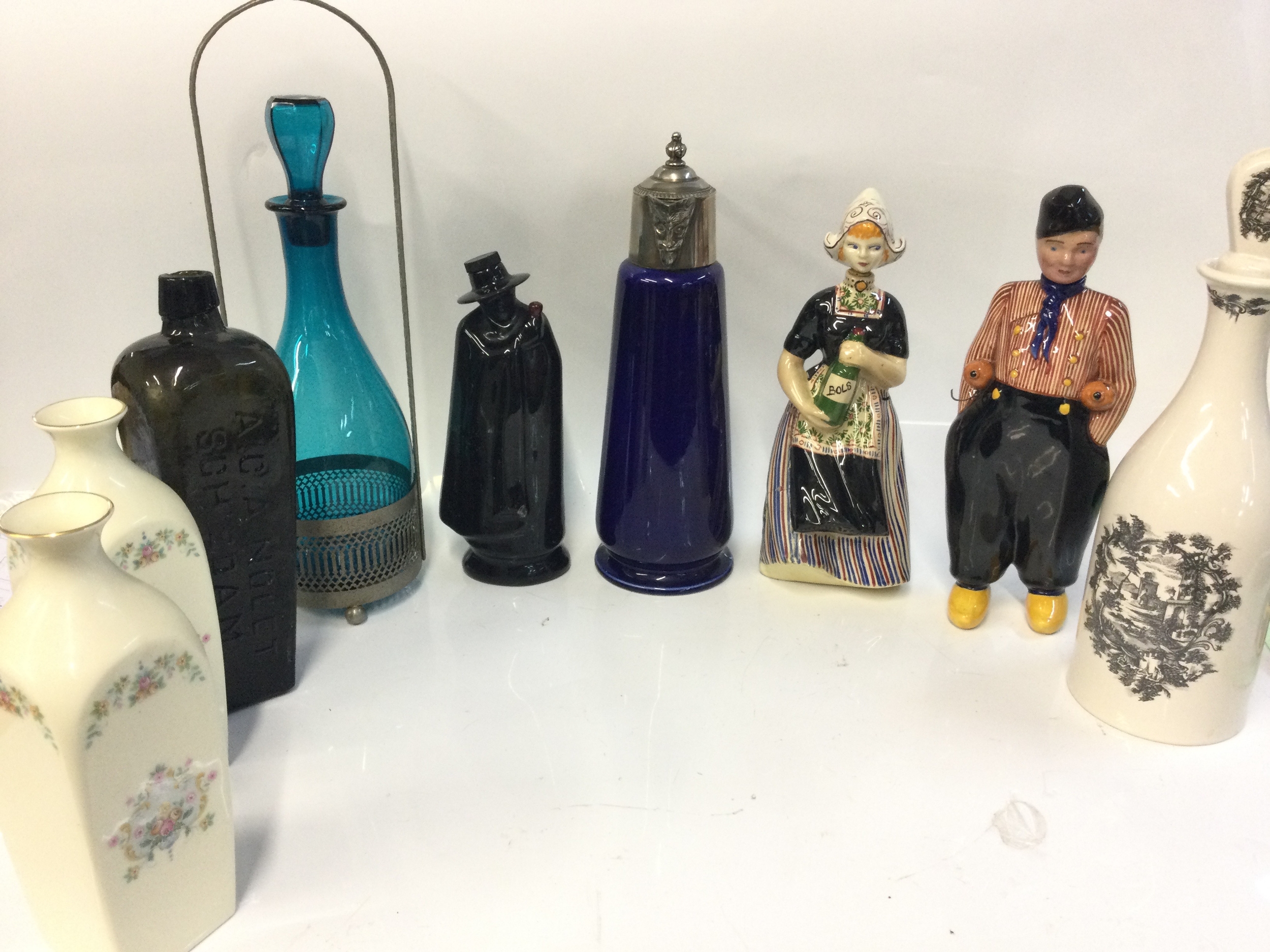 A pair of Royal Doulton Juliet vases, Wade Falstaff cobalt blue claret jug, Coalport limited edition decanter, decanter figure, blue glass wine decanter 