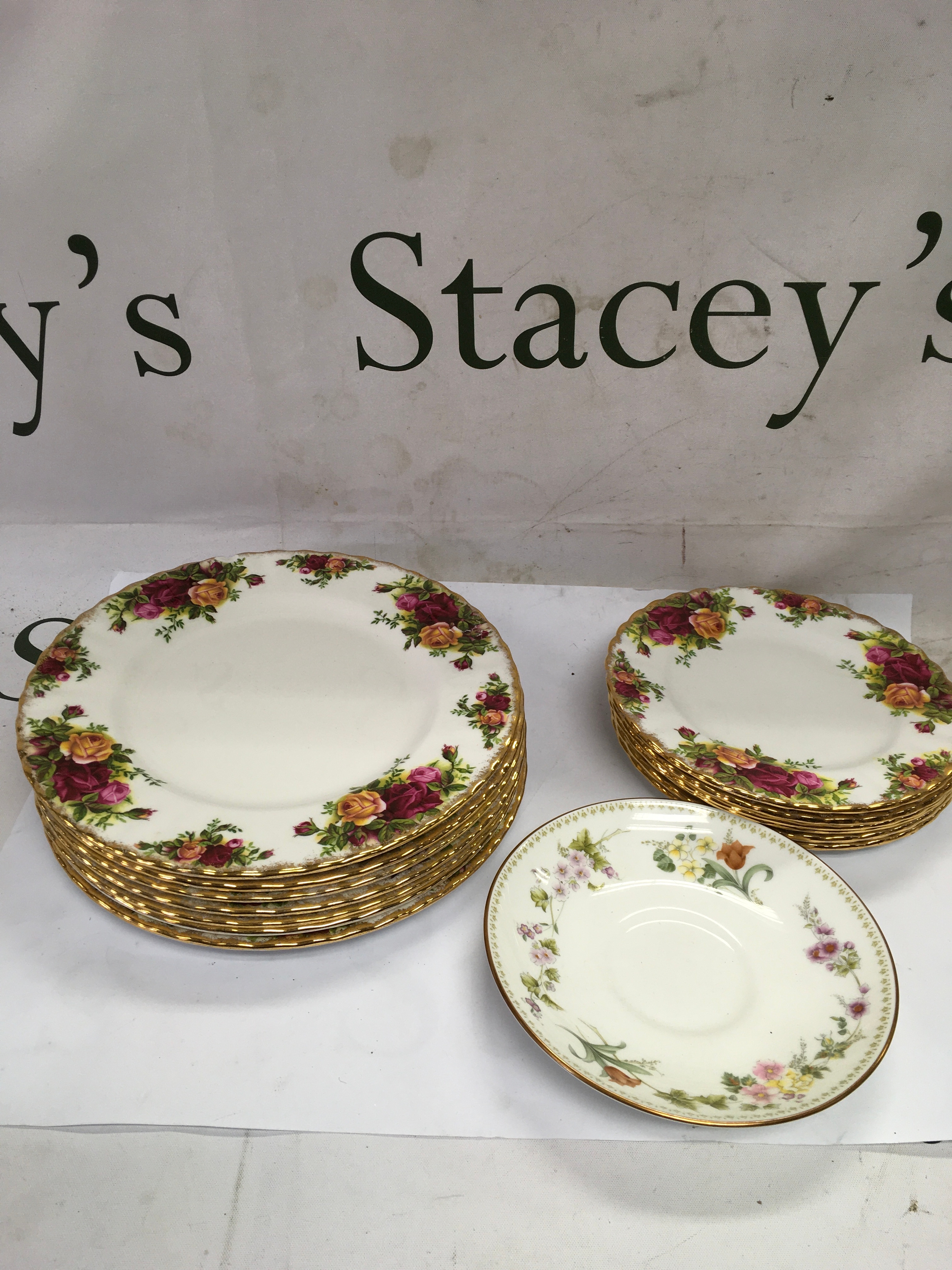 A lot of Royal Albert ceramic plates and an additional wedgwood plate