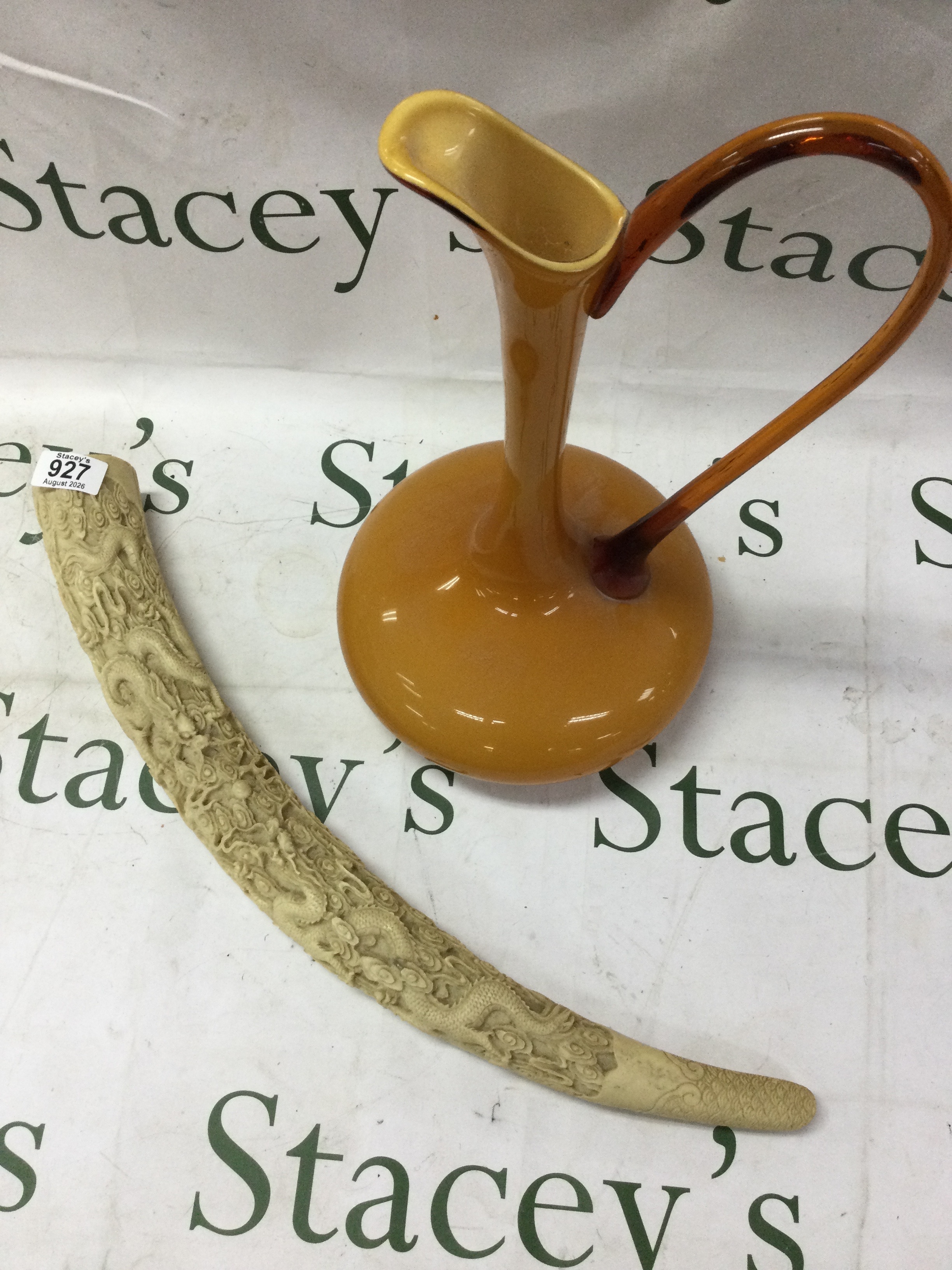 Italian glass ewer and resin carved Chinese tusk.