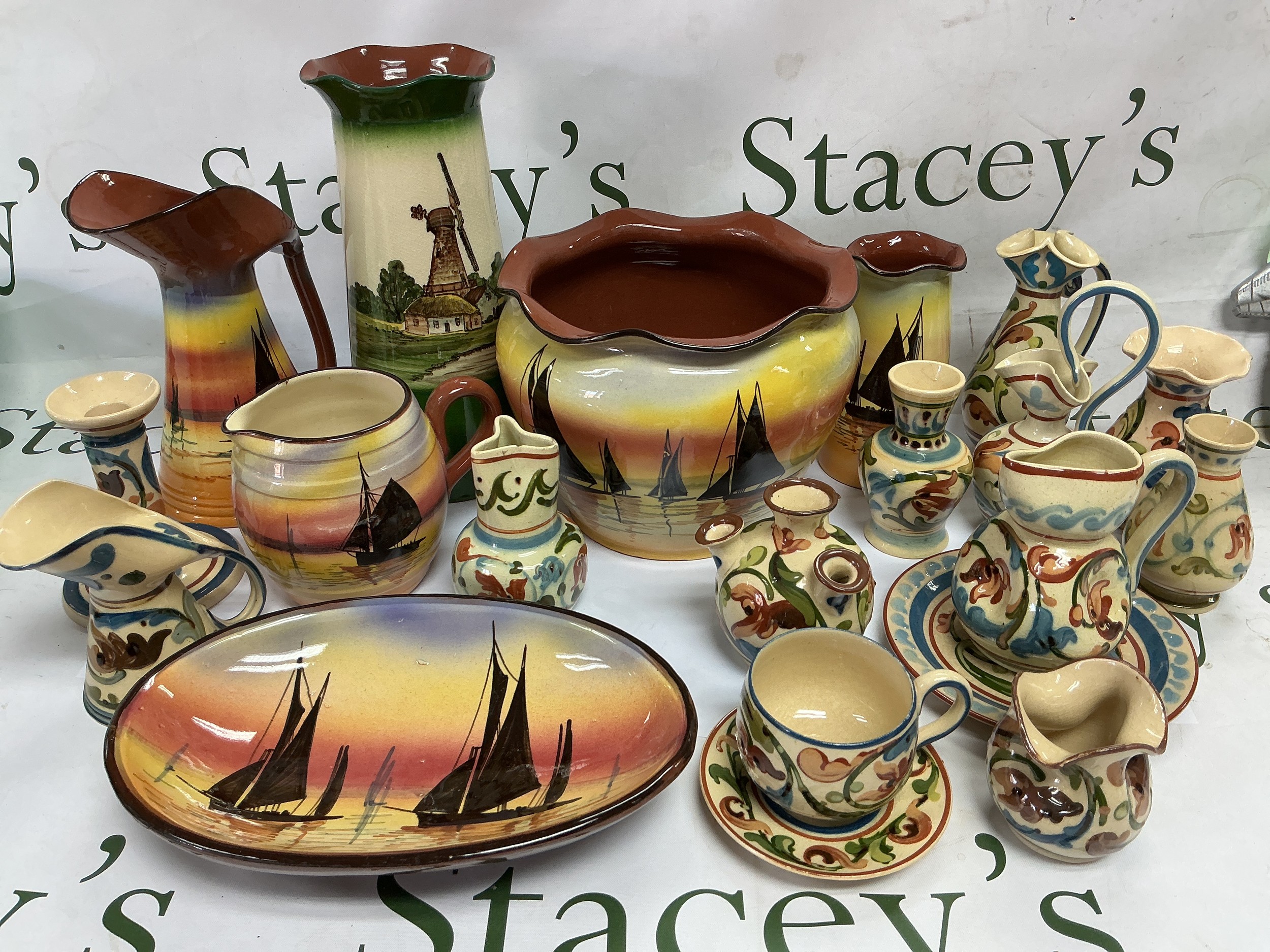A collection of studio pottery, Torquay ware and other ceramic and glass items.