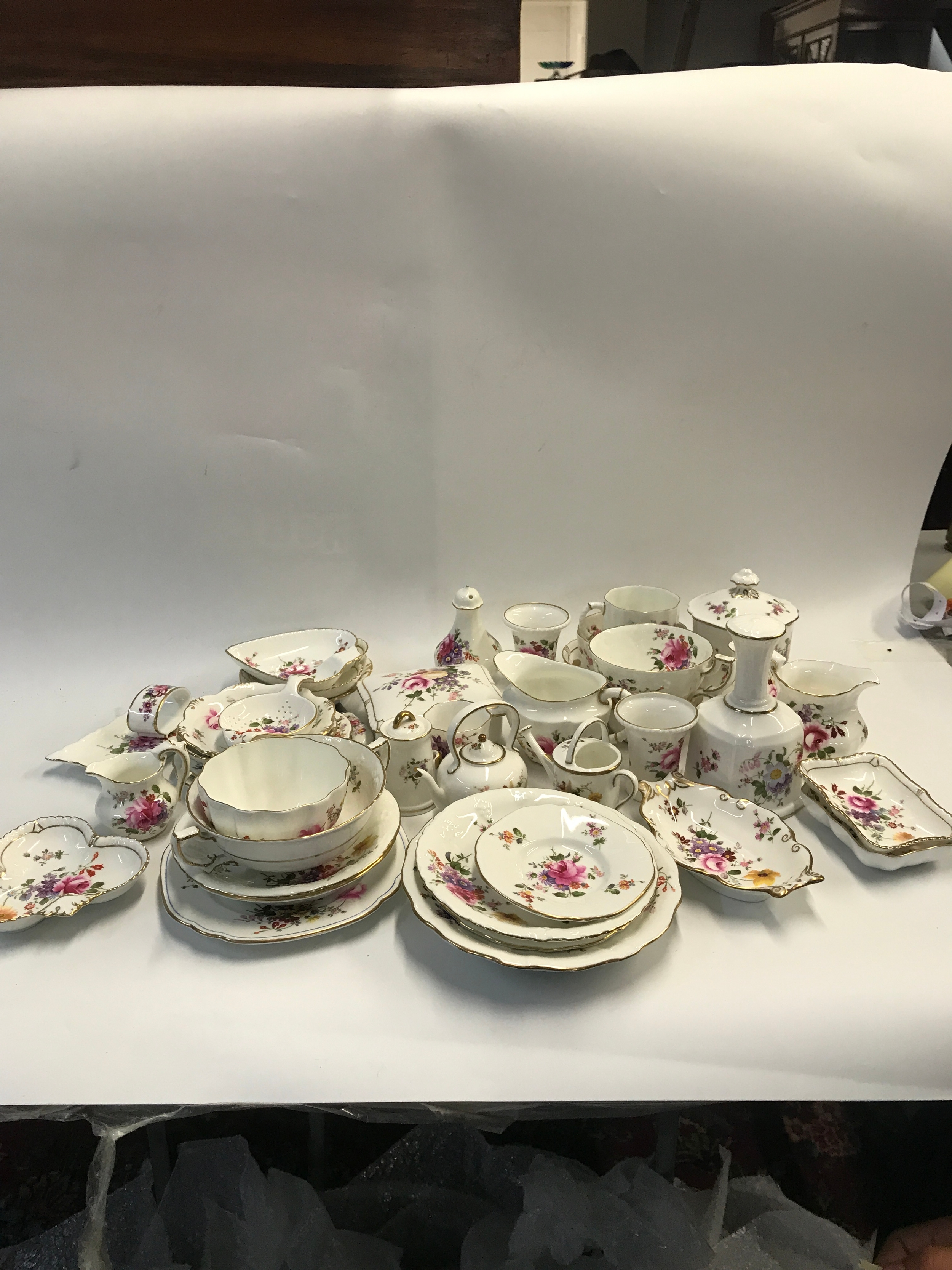 This is a collection of fine bone Royal Crown Derby tableware. 