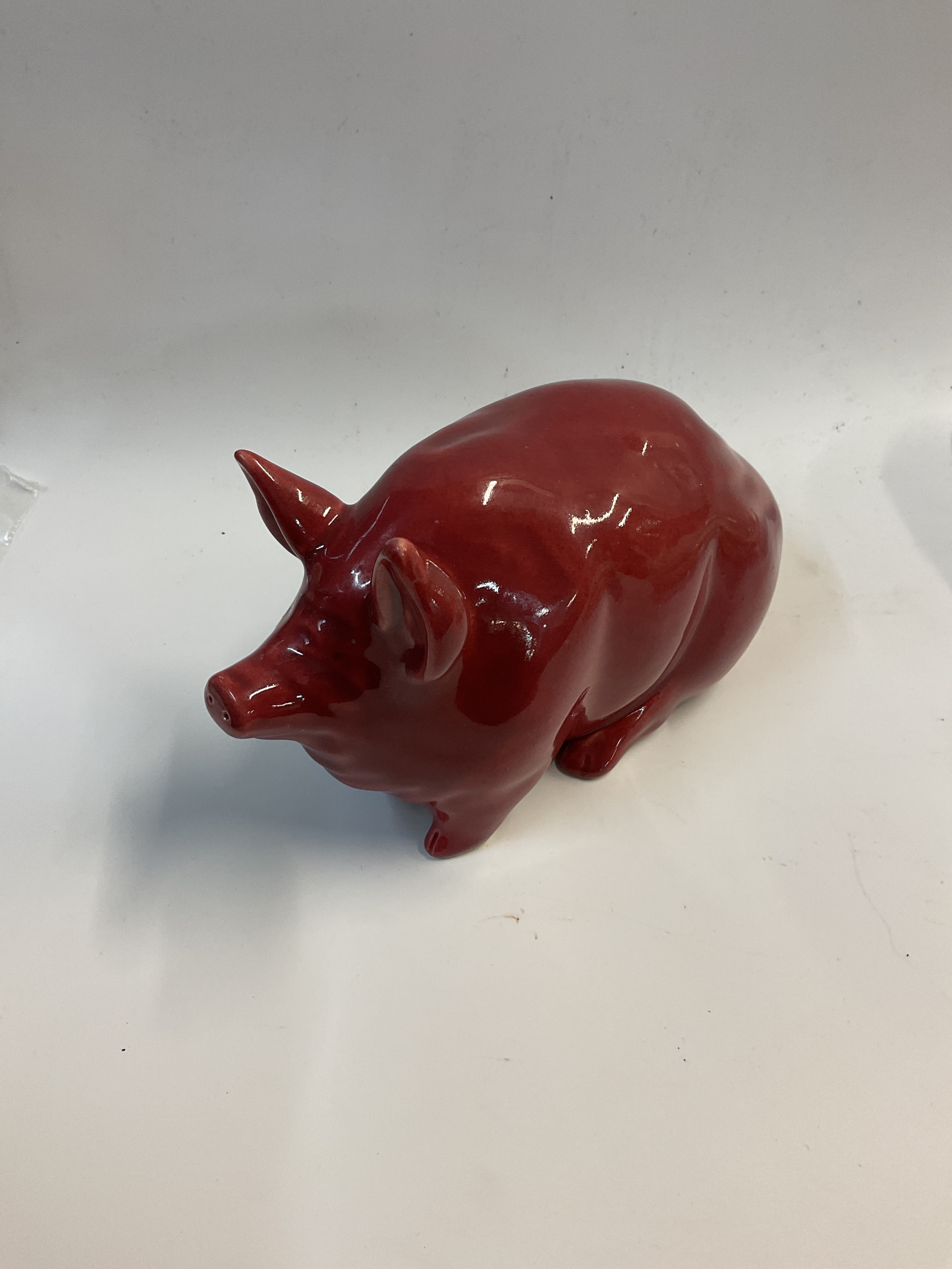Wemyss red pig figure, marked to the base.