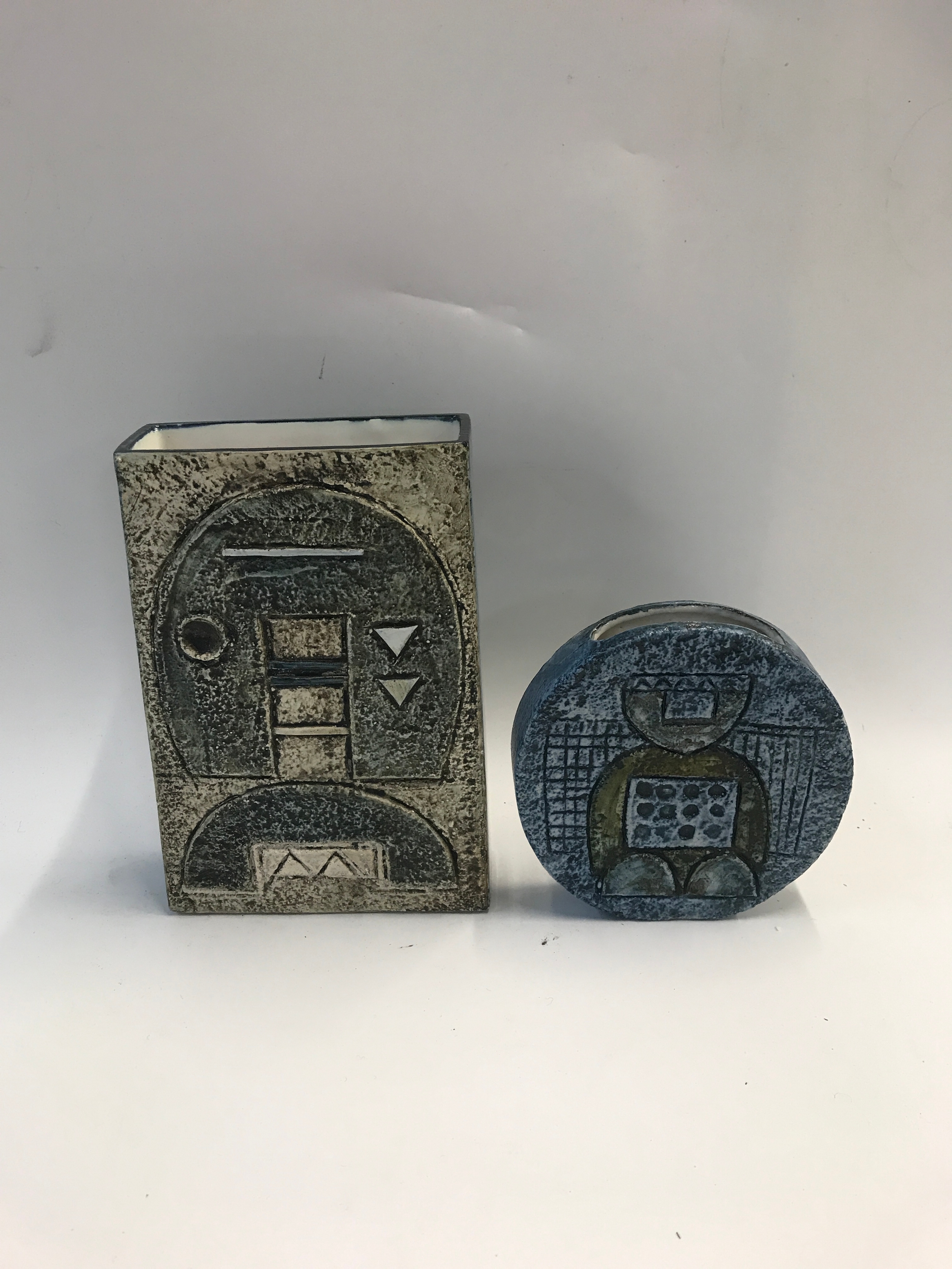 A Troika square vase with glazed sides and a Troika disc vase 