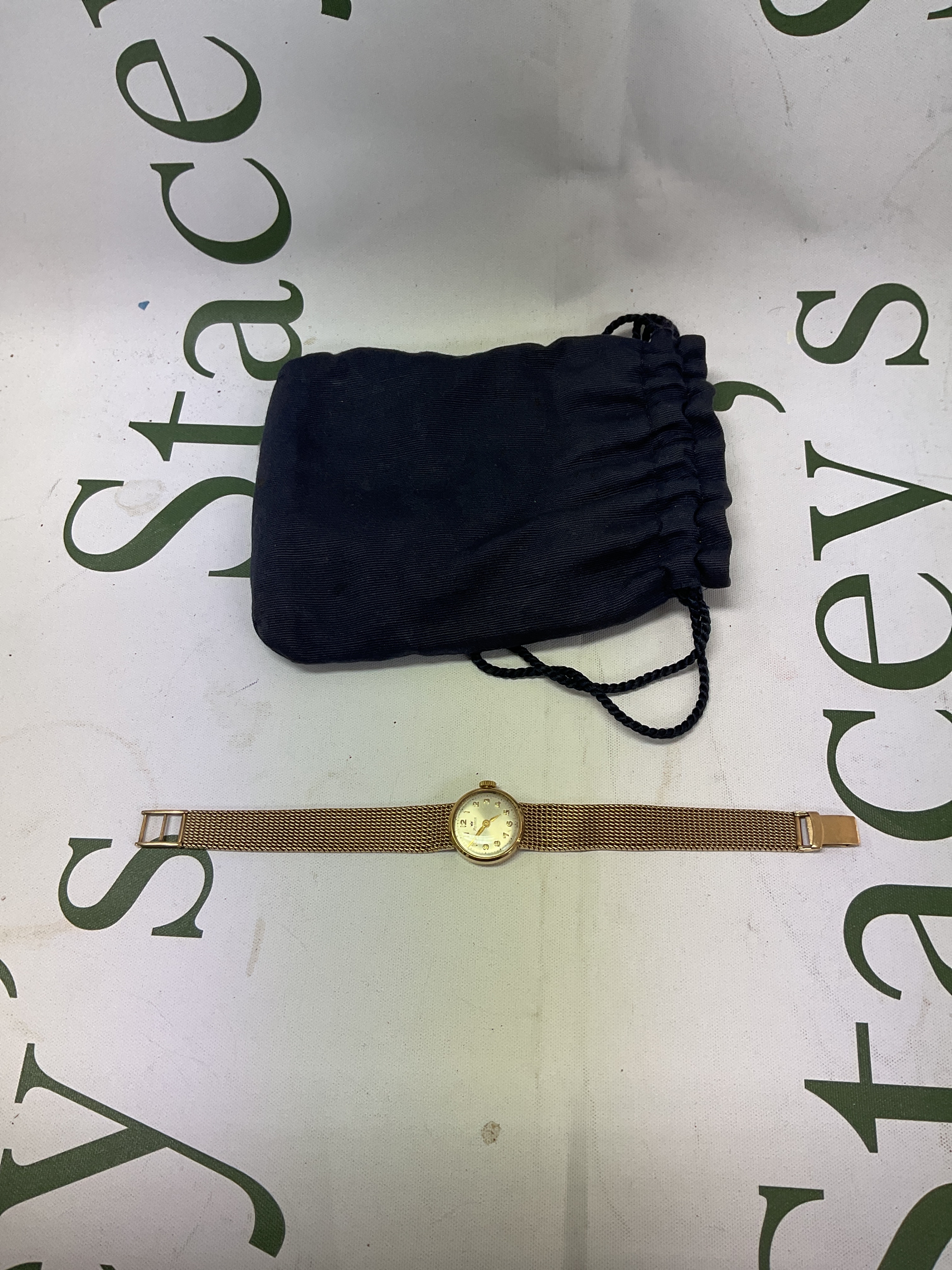 Ladies 9 ct Rolder watch with gold strap total weight 29.6 grams.