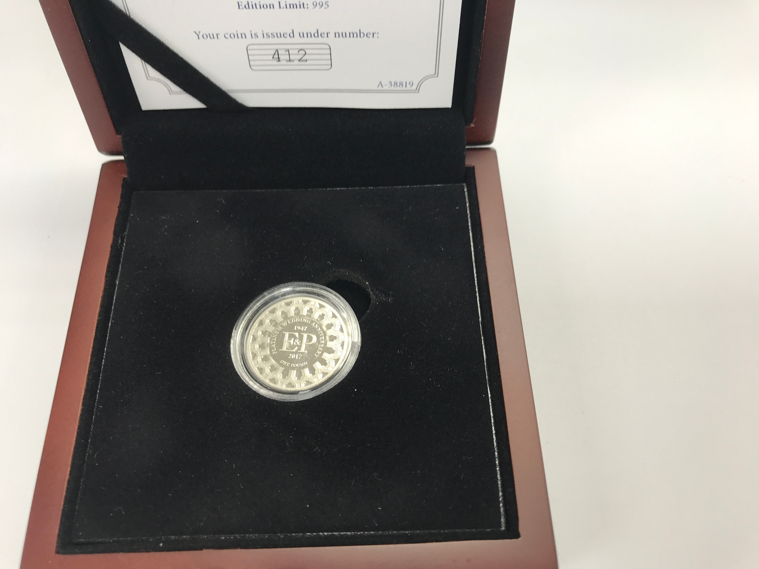 2017 Bailiwick of Jersey Platinum Wedding Anniversary Proof One Pound Coin issued to commemorate the 70th wedding anniversary of HM Queen Elizabeth II and HRH The Duke of Edinburgh