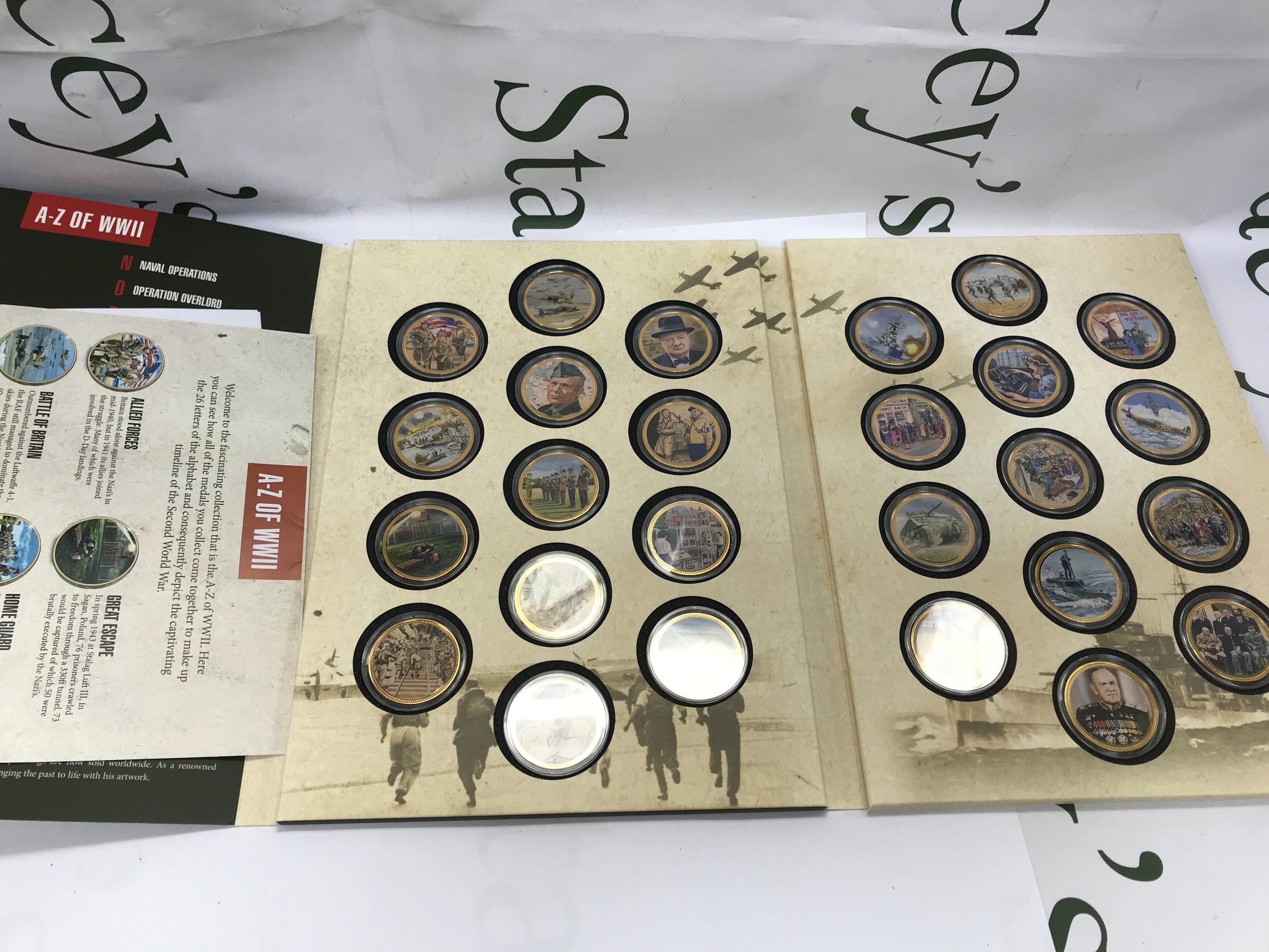 commemorative coin and medal folder set titled "A-Z of WWII"
