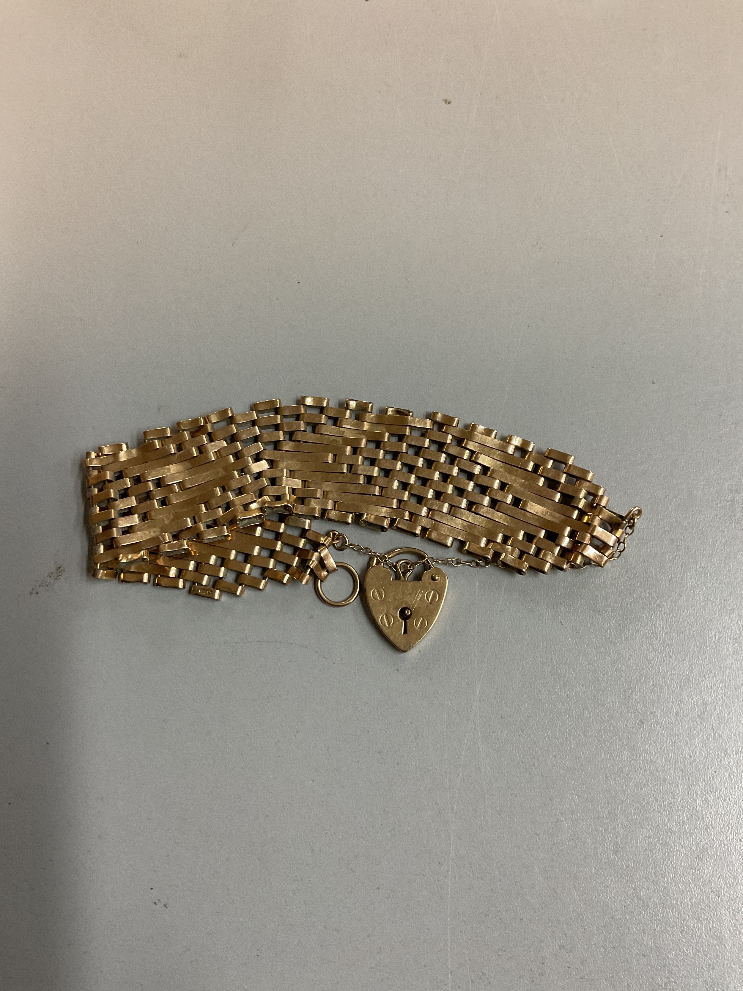 Seven bar gate bracelet, 9 ct weight 17.8 grams.