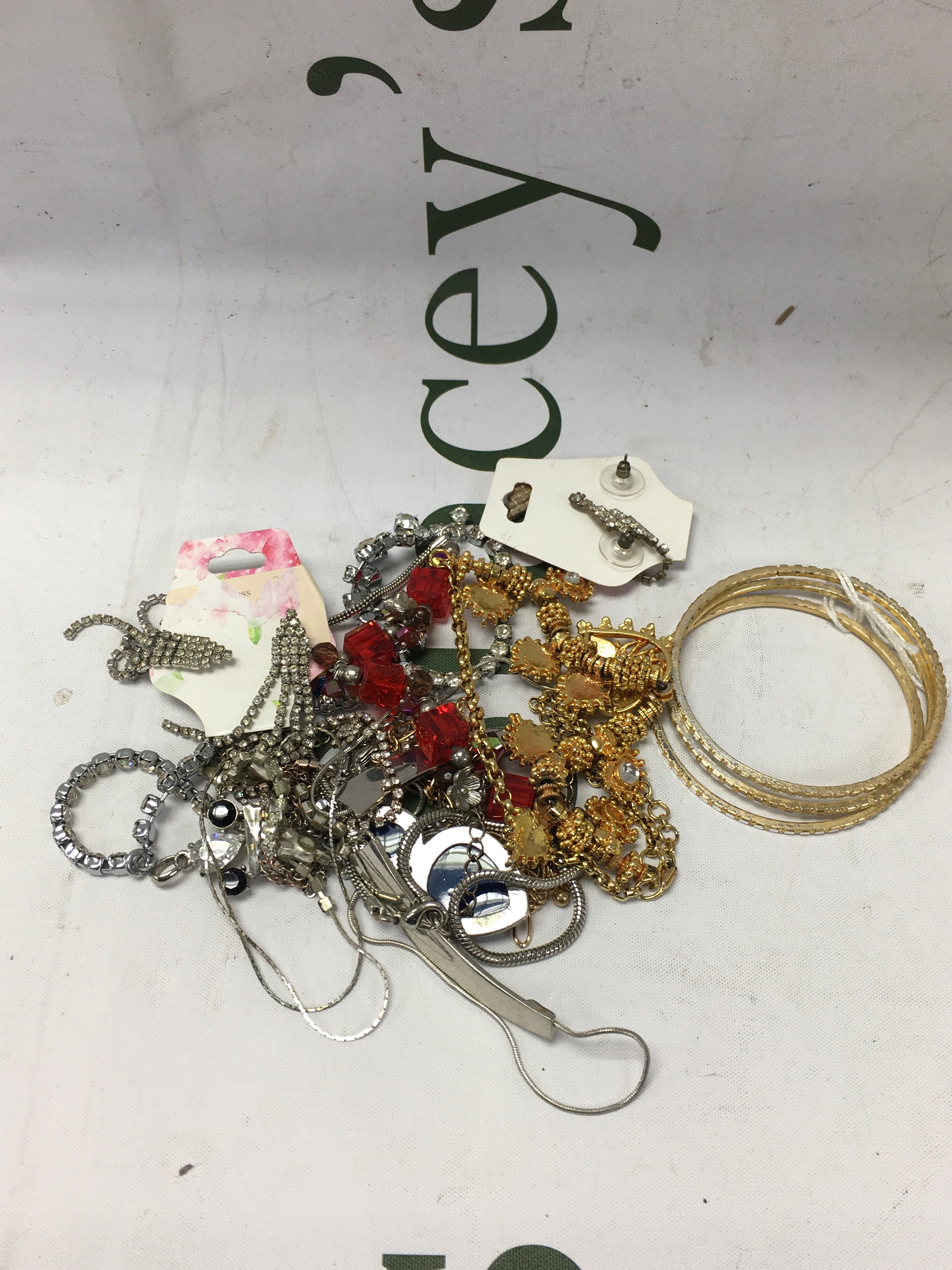 A mixed collection of jewellery including bracelets and necklaces 